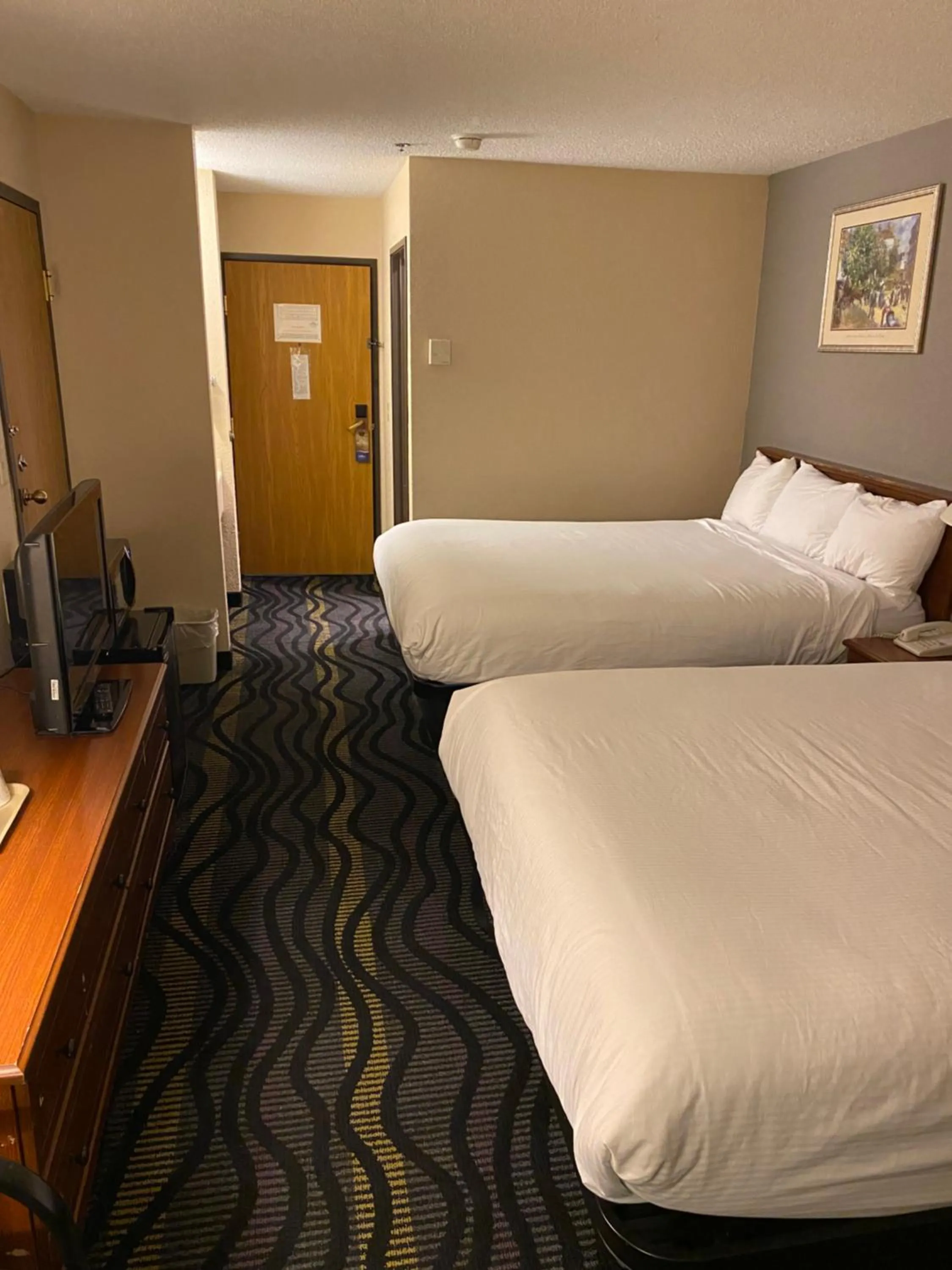 Bed in Baymont by Wyndham Logan