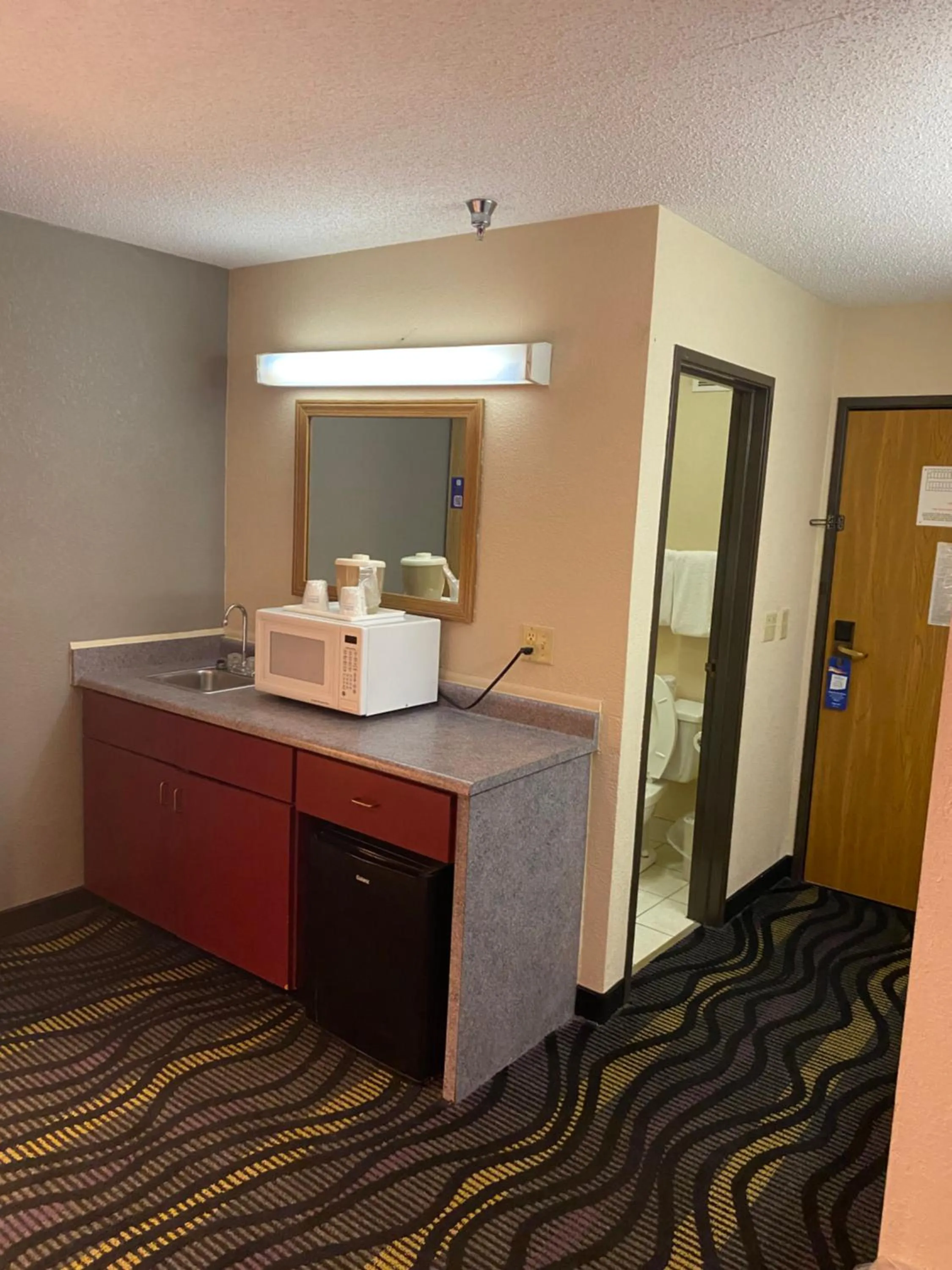 Bedroom in Baymont by Wyndham Logan