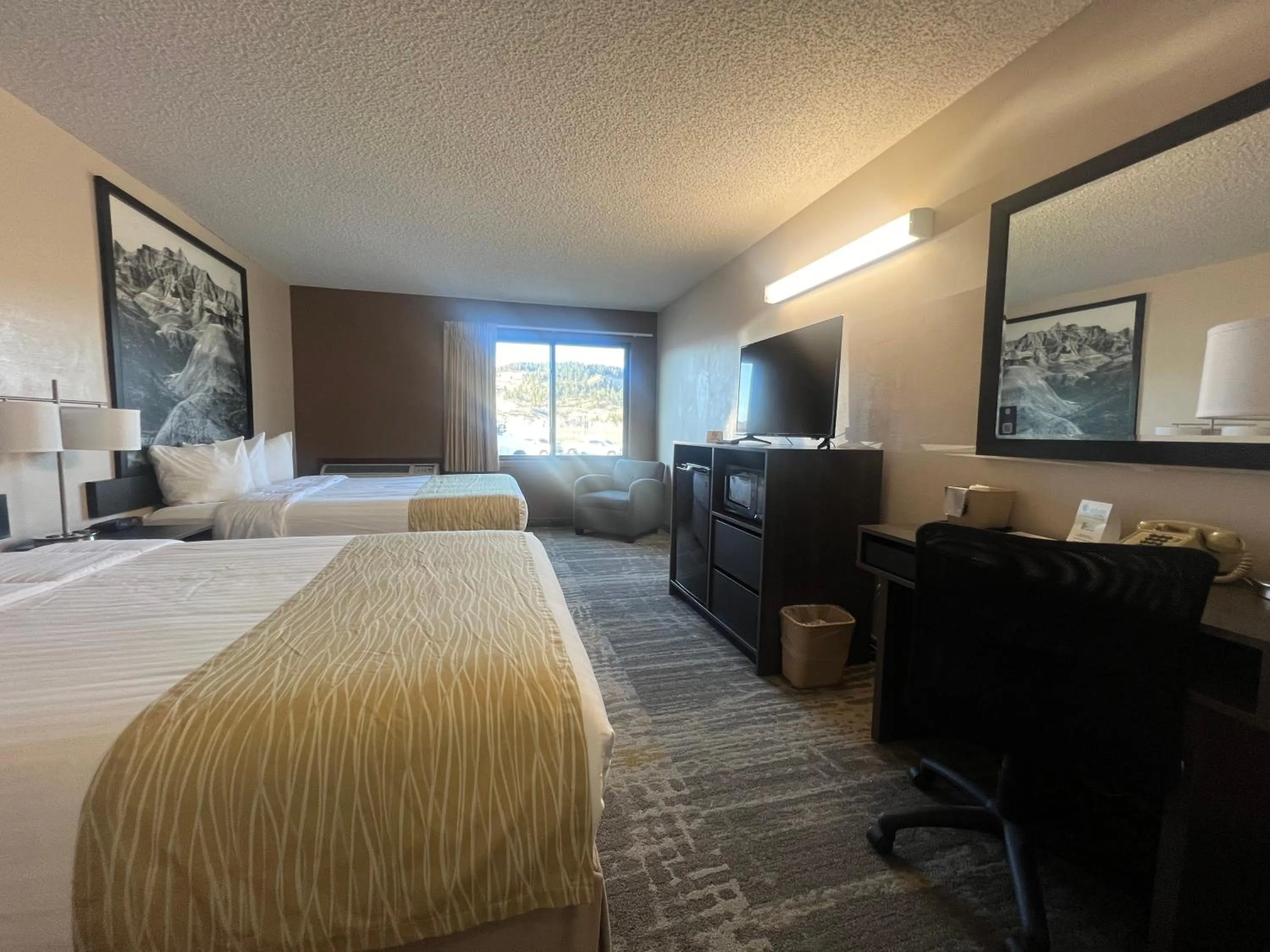 Bed in Super 8 by Wyndham Sturgis