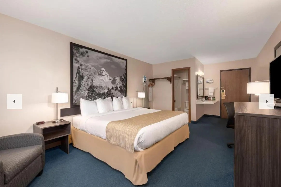 Bed in Super 8 by Wyndham Sturgis