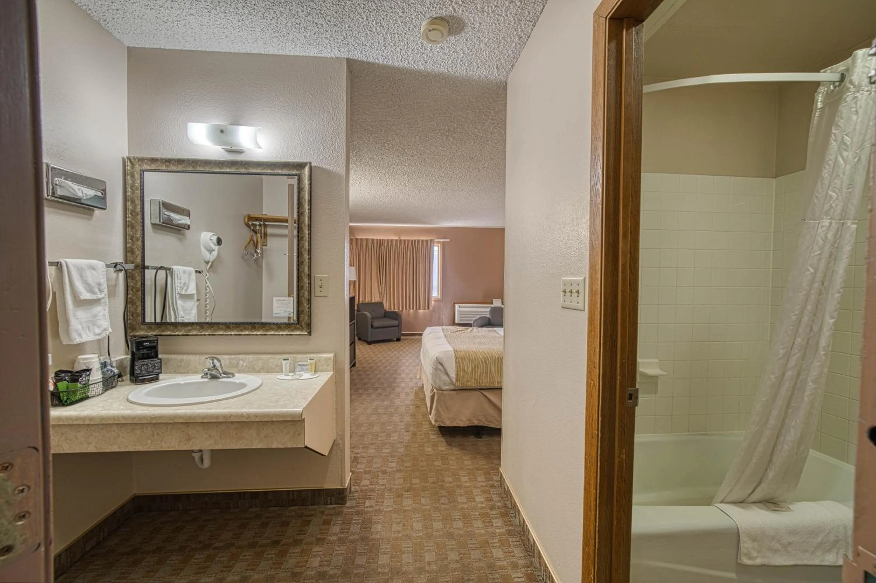 Bathroom, Bed in Super 8 by Wyndham Sturgis