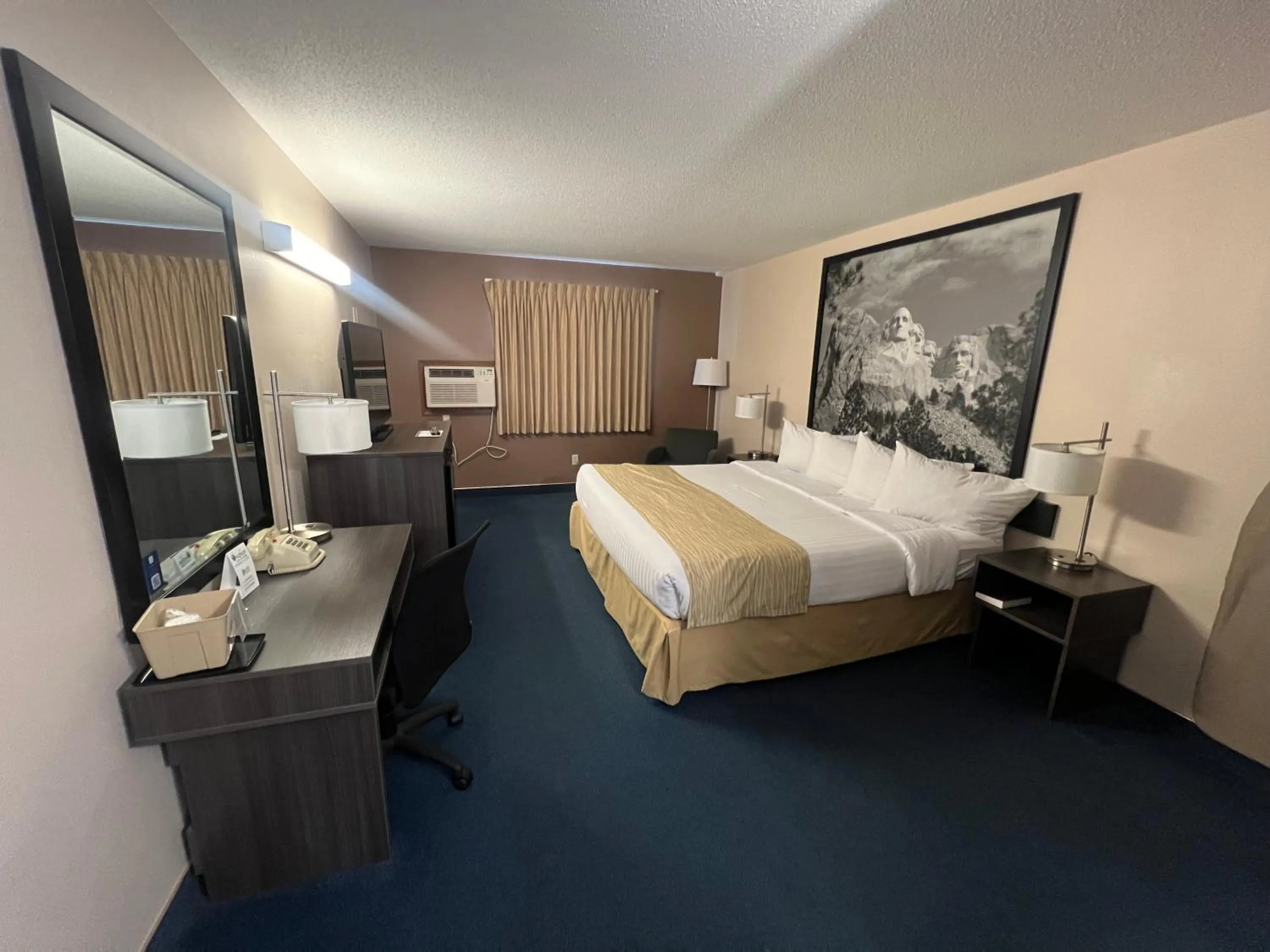 Bed in Super 8 by Wyndham Sturgis