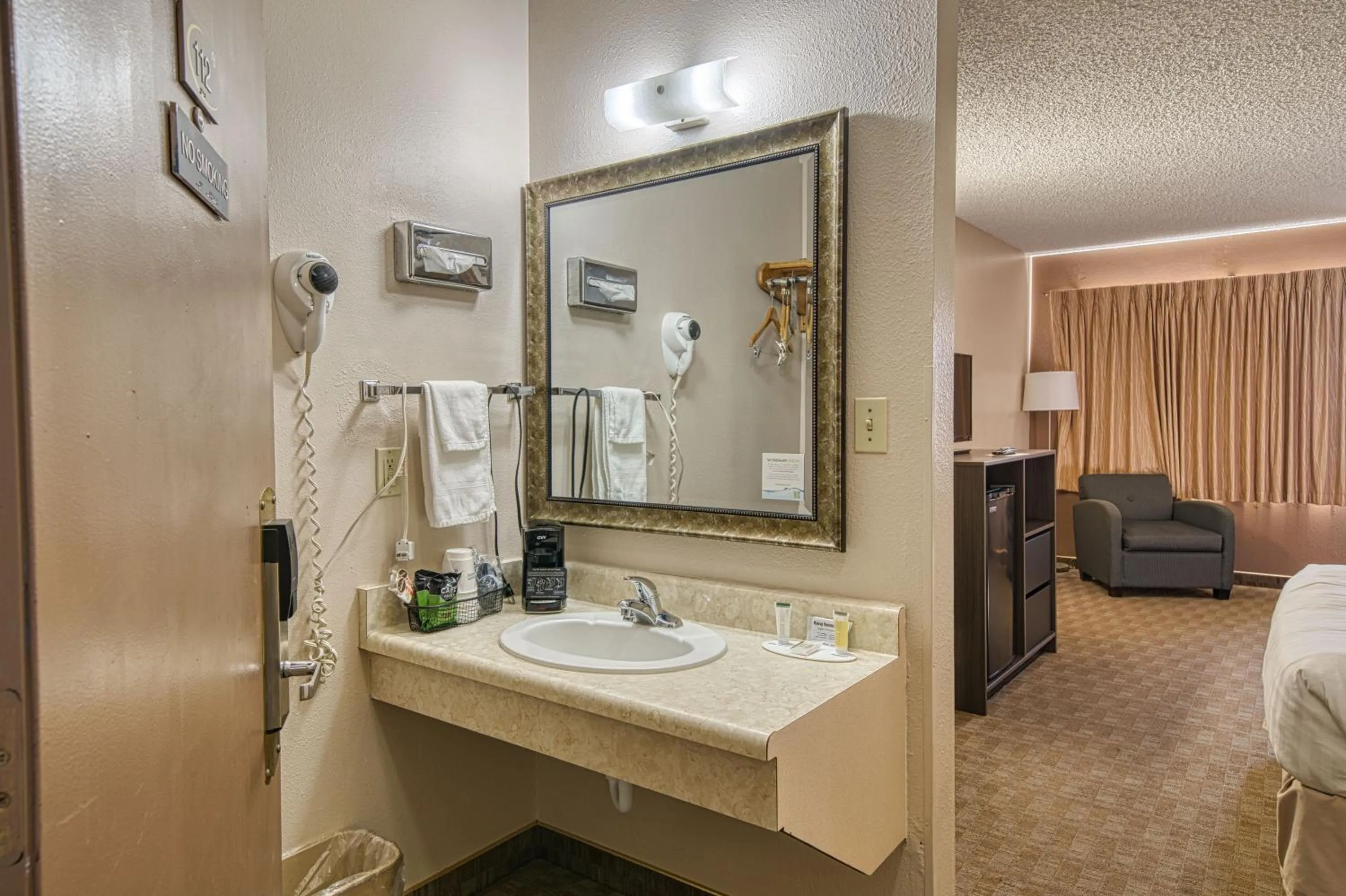 towels, Bed in Super 8 by Wyndham Sturgis