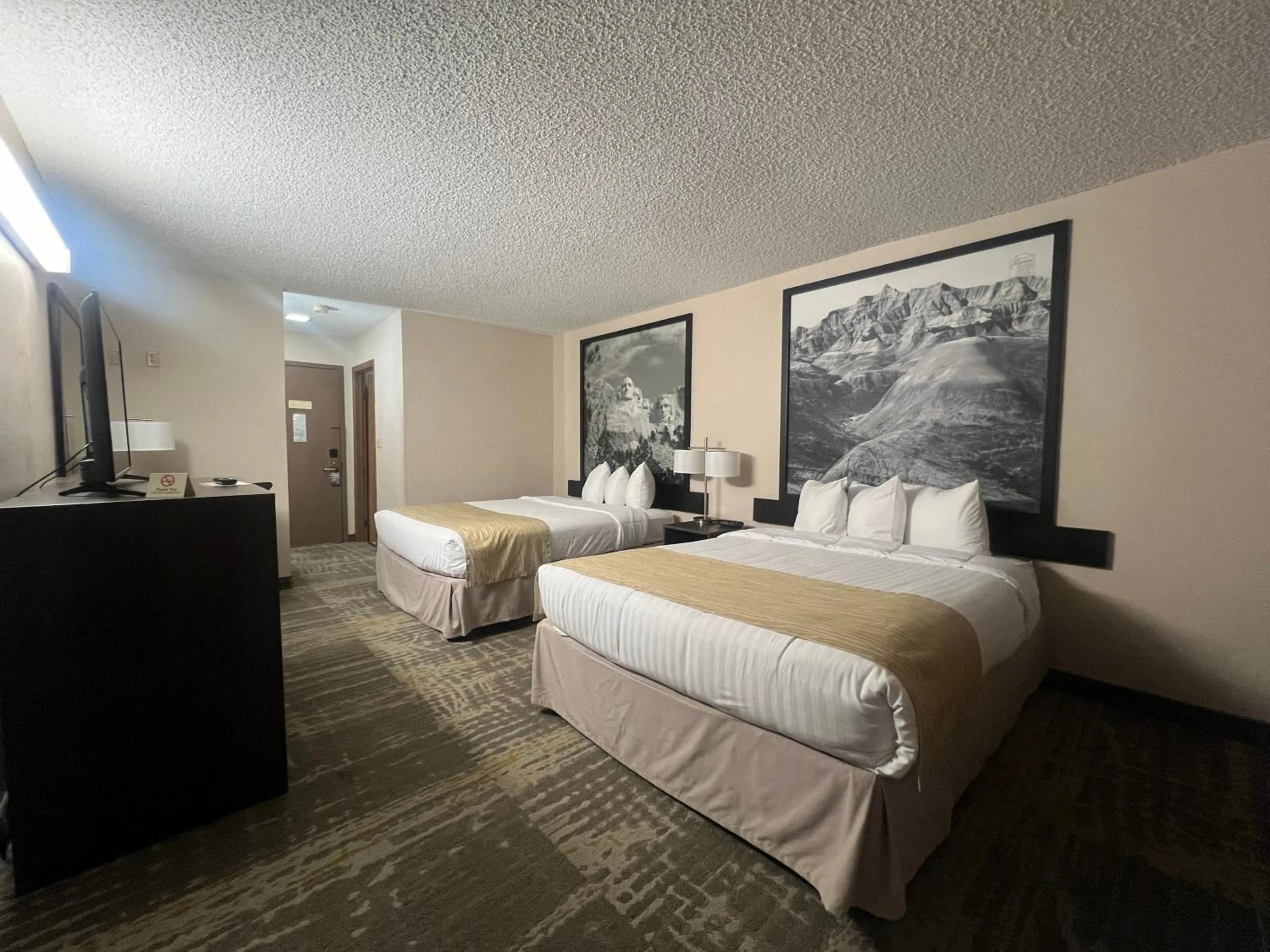 Bed in Super 8 by Wyndham Sturgis