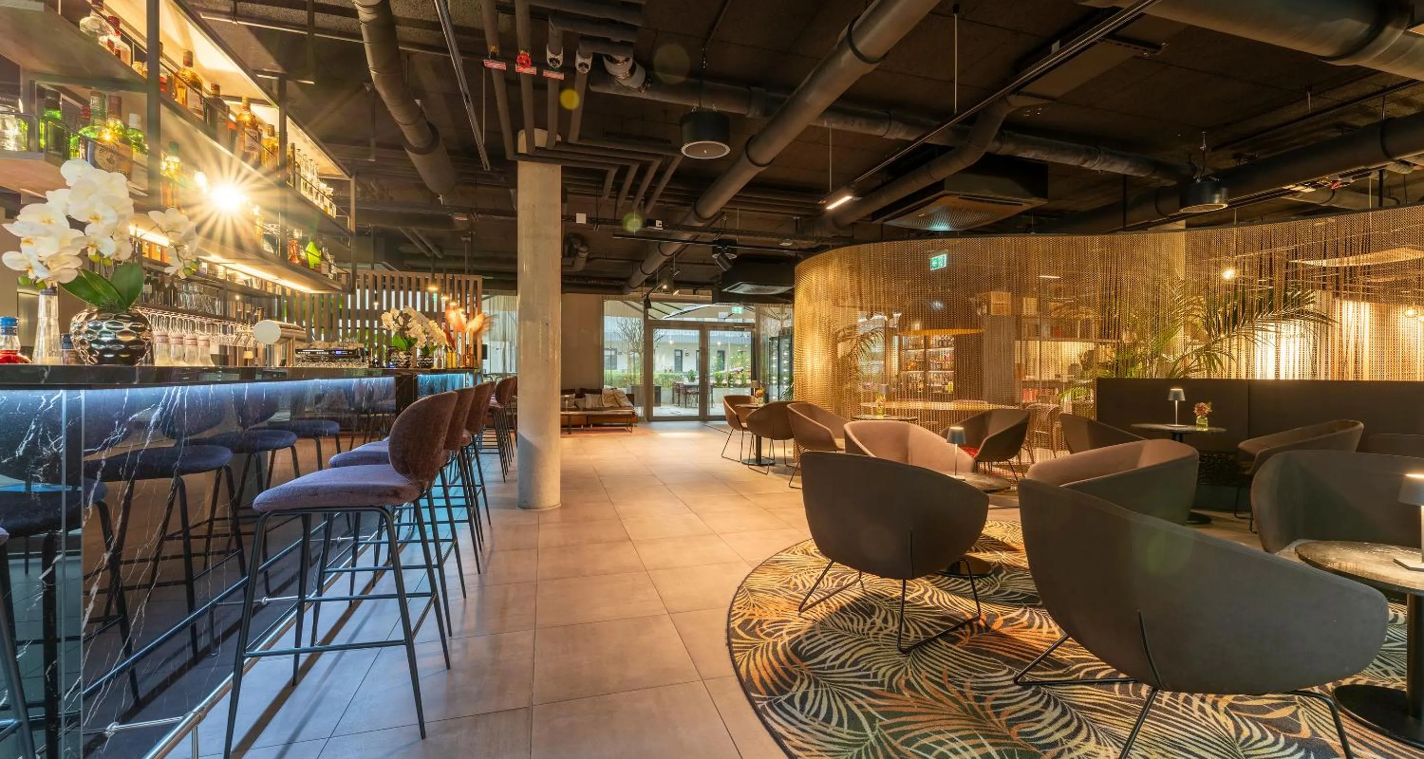 Lounge or bar in Aiden by Best Western Biberach