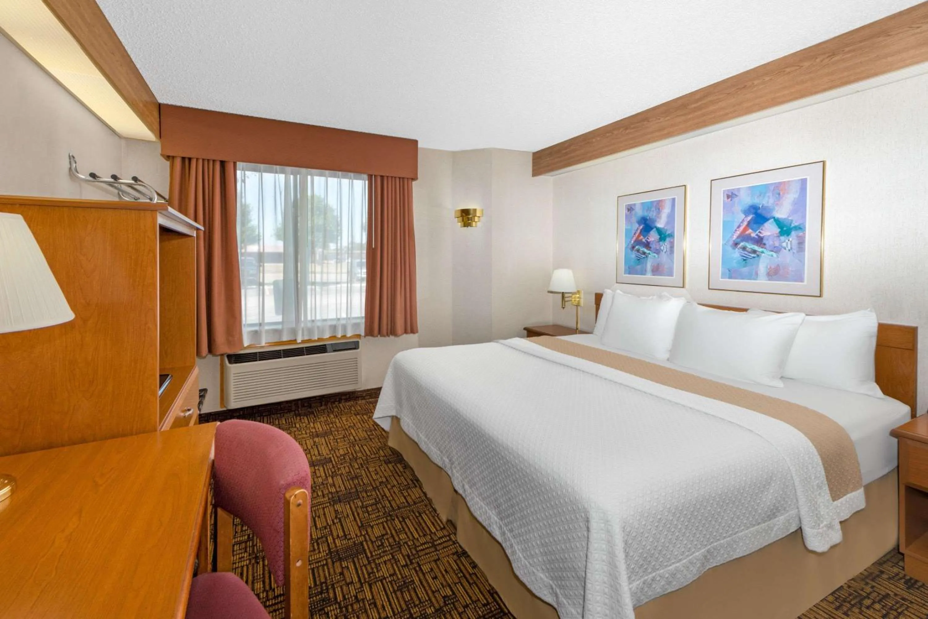Photo of the whole room, Bed in Days Inn by Wyndham Liberal KS