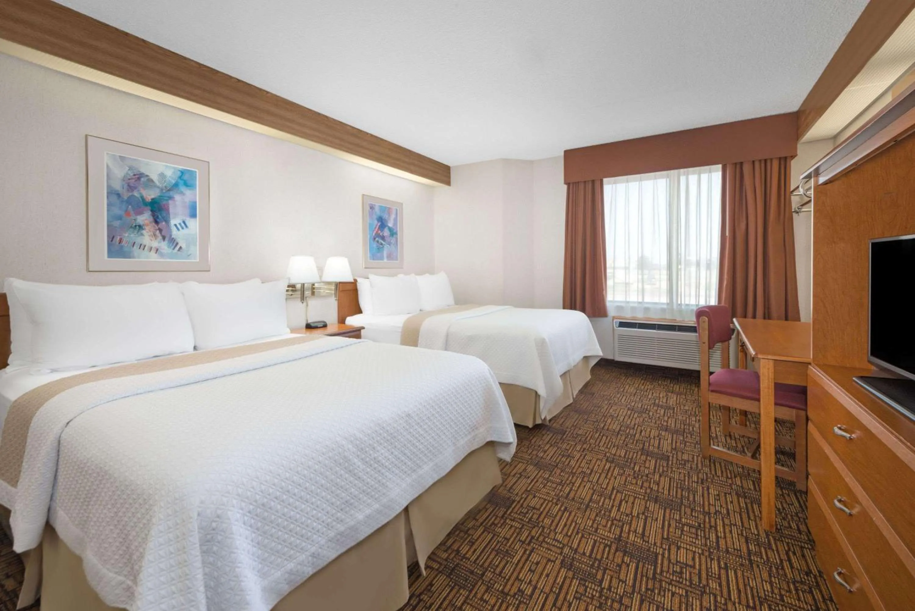 Photo of the whole room, Bed in Days Inn by Wyndham Liberal KS