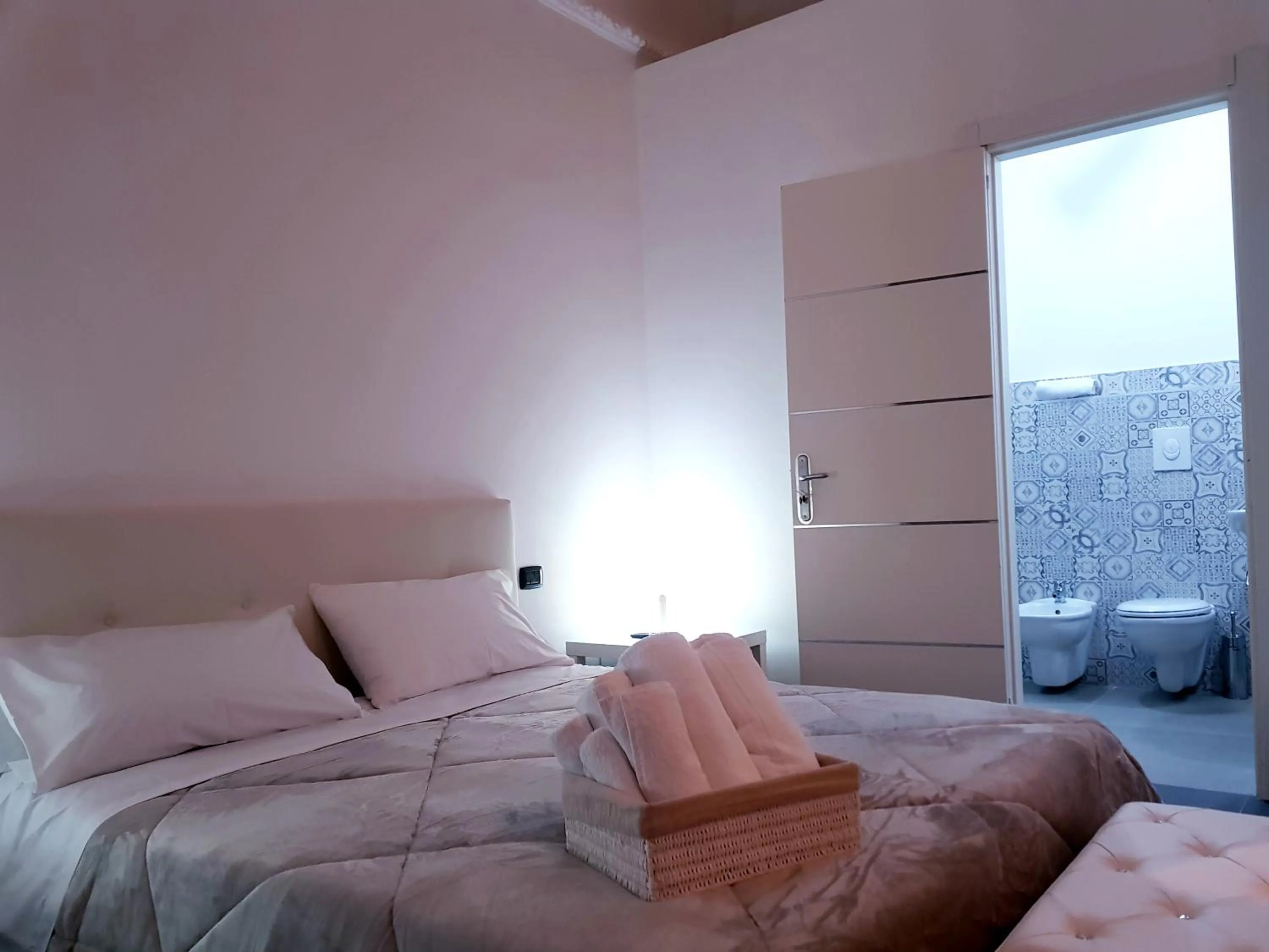 Bed in Pupi 93 Rooms