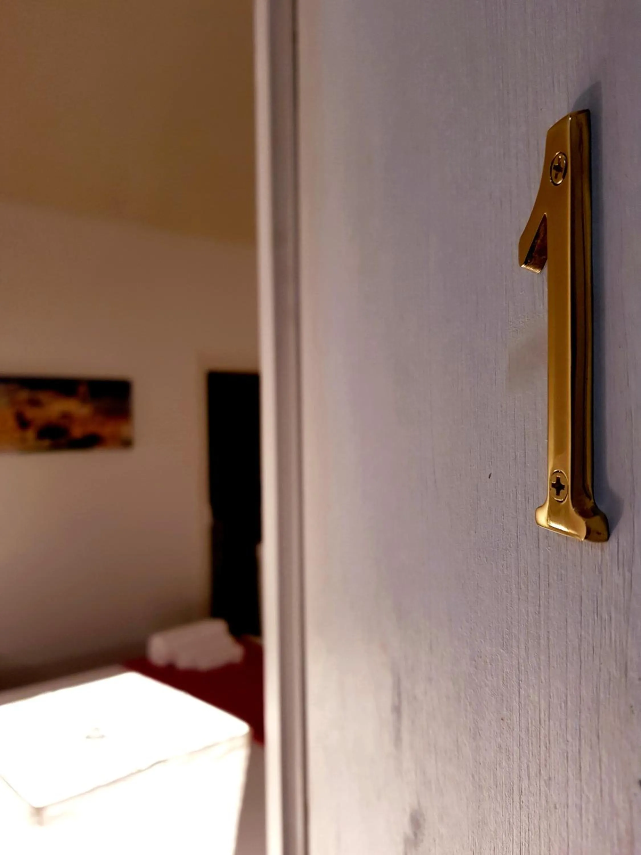 Decorative detail, Bed in Pupi 93 Rooms