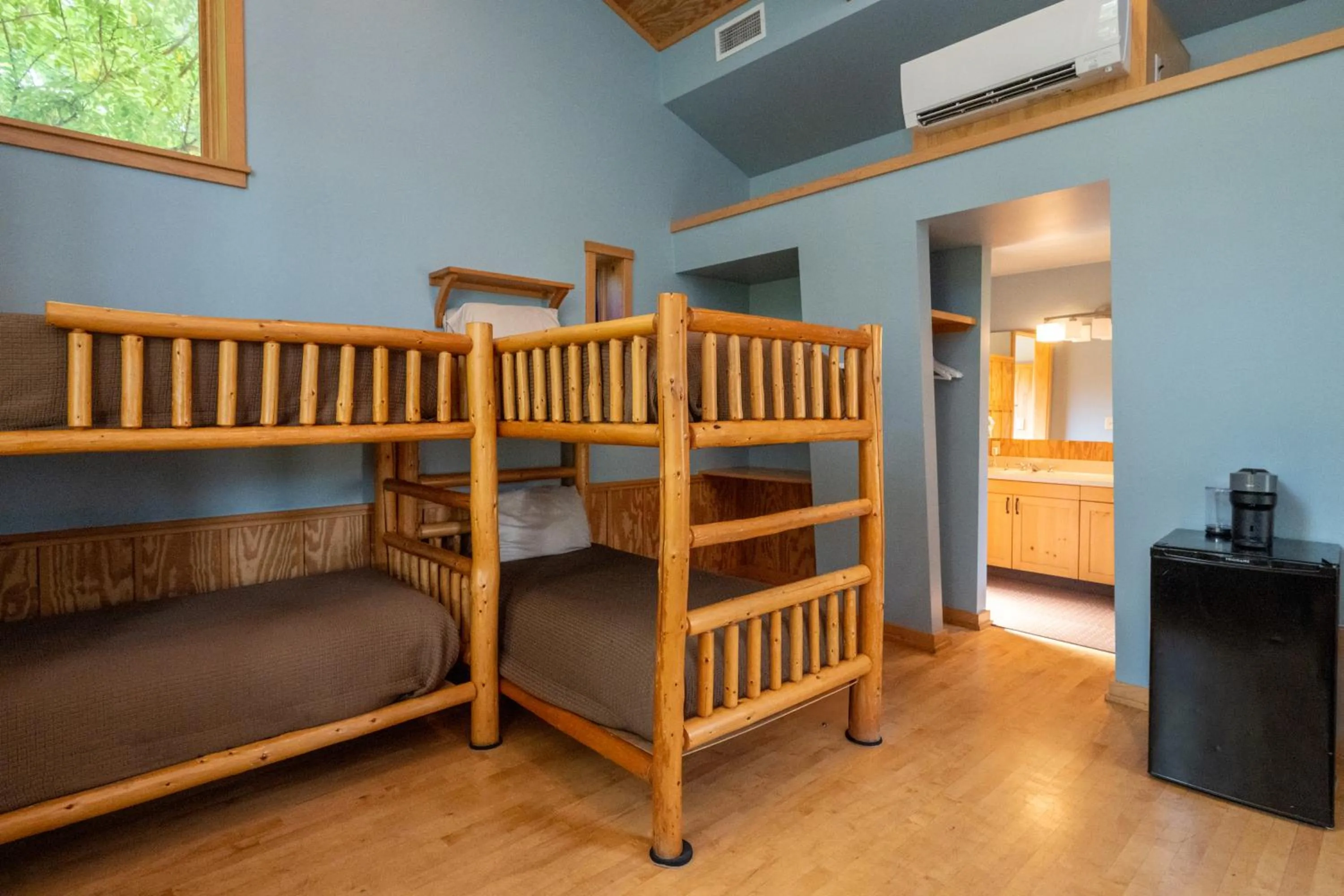 Bed in Sleeping Lady Mountain Resort