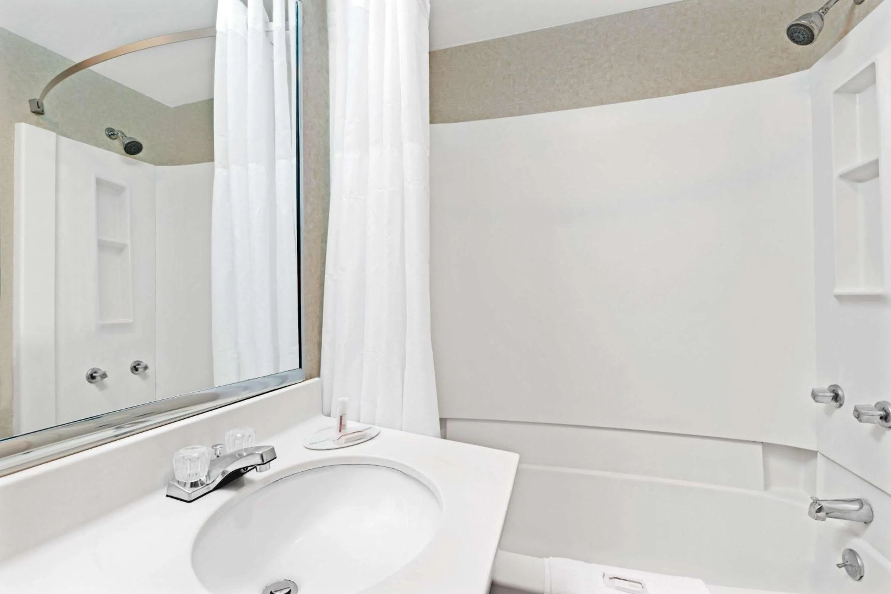 On site, Bathroom in Super 8 by Wyndham Kenmore/Buffalo/Niagara Falls Area