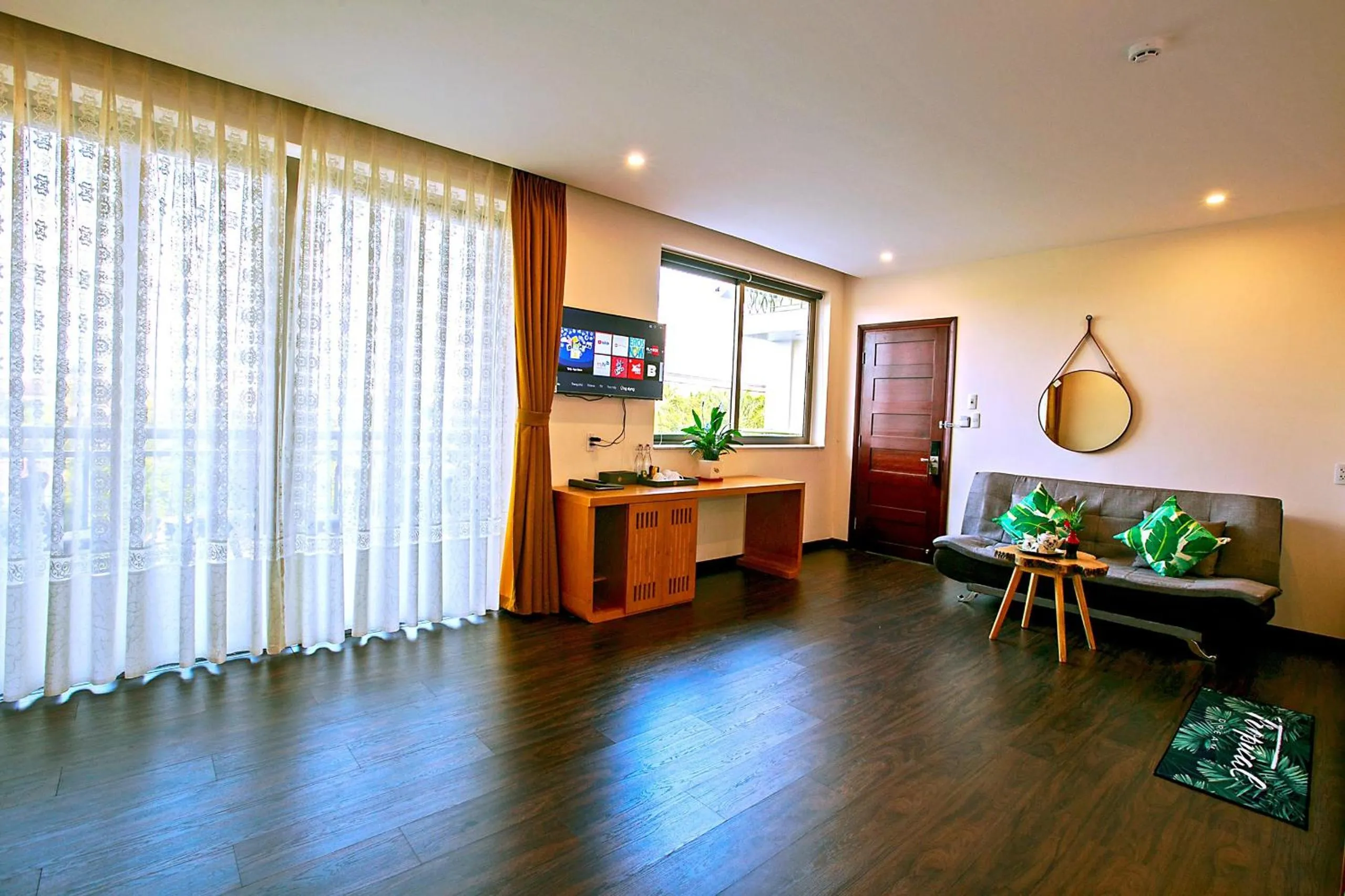 Communal lounge/ TV room in Silk and Sea Hotel