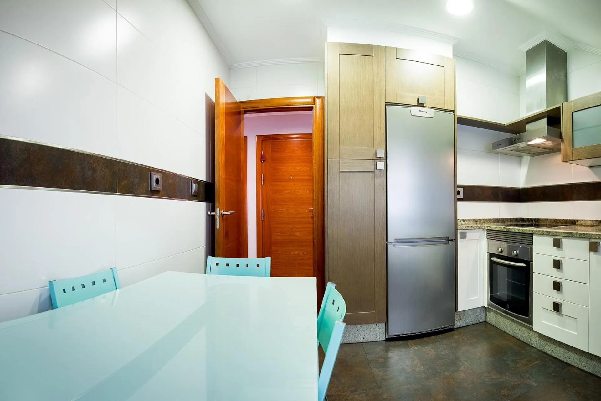 Kitchen or kitchenette in Apartamentos Villa Zoila Baiona