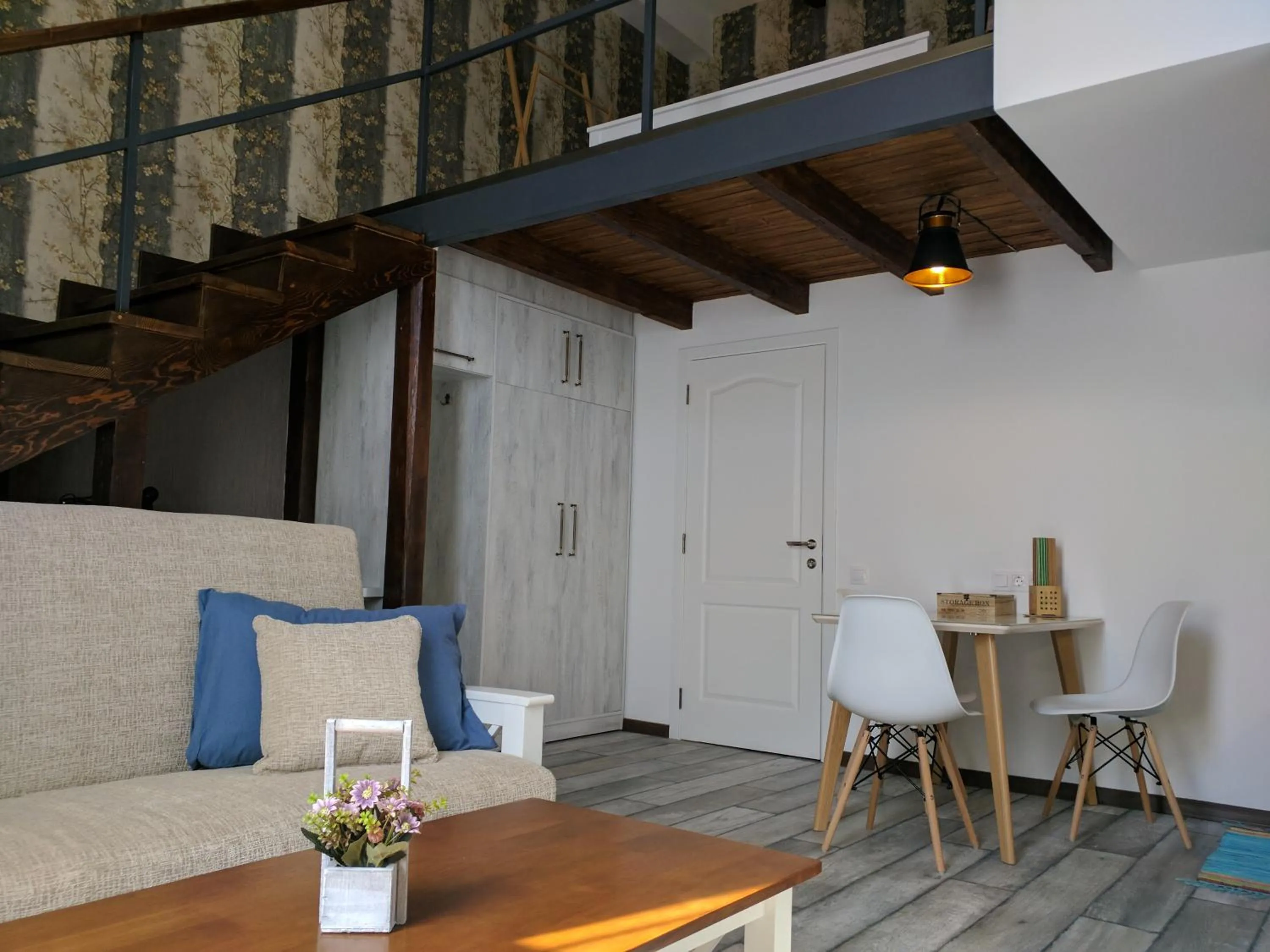 Seating area in Cozy Studios on Freedom Square