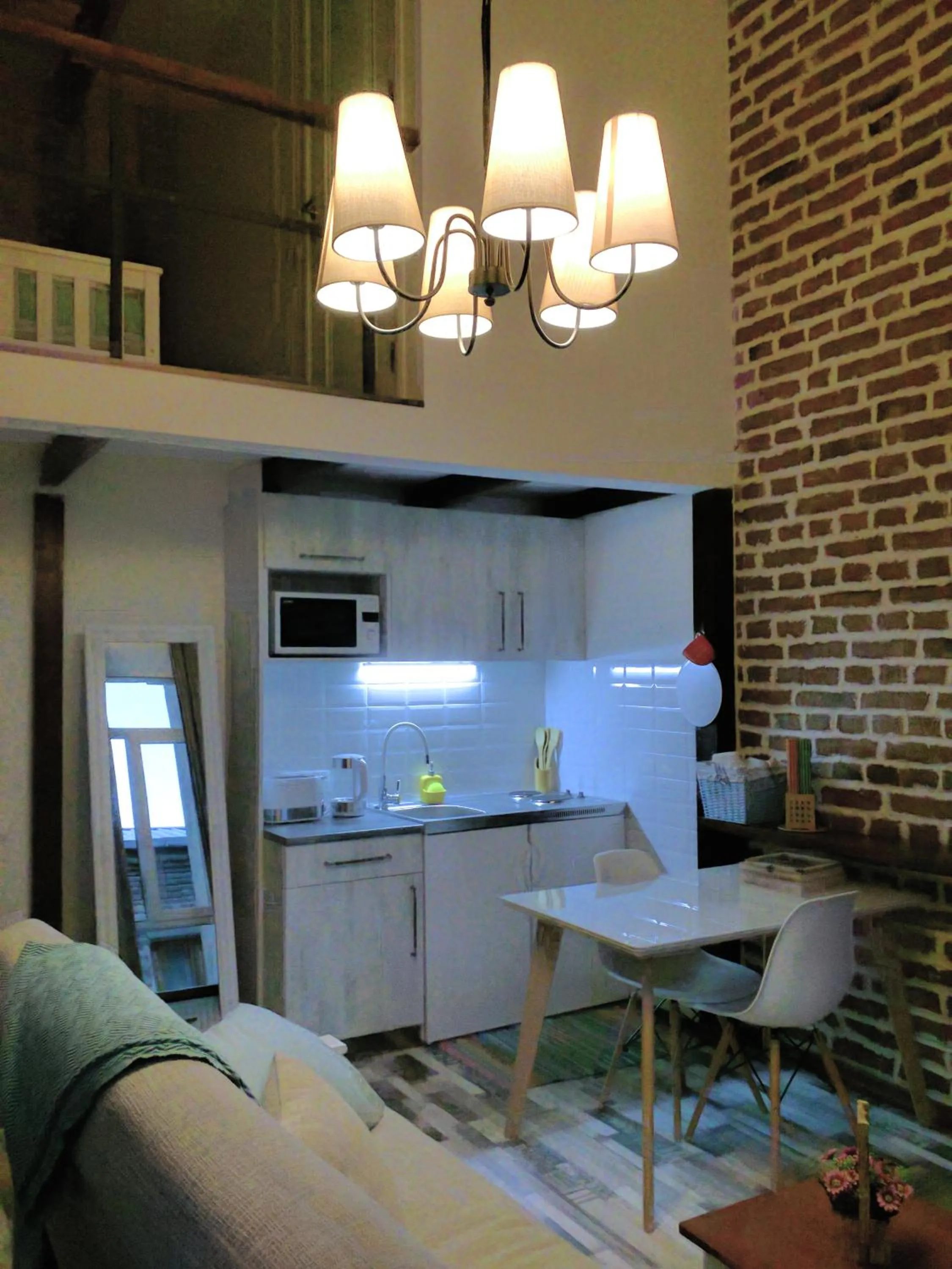 Kitchen or kitchenette in Cozy Studios on Freedom Square