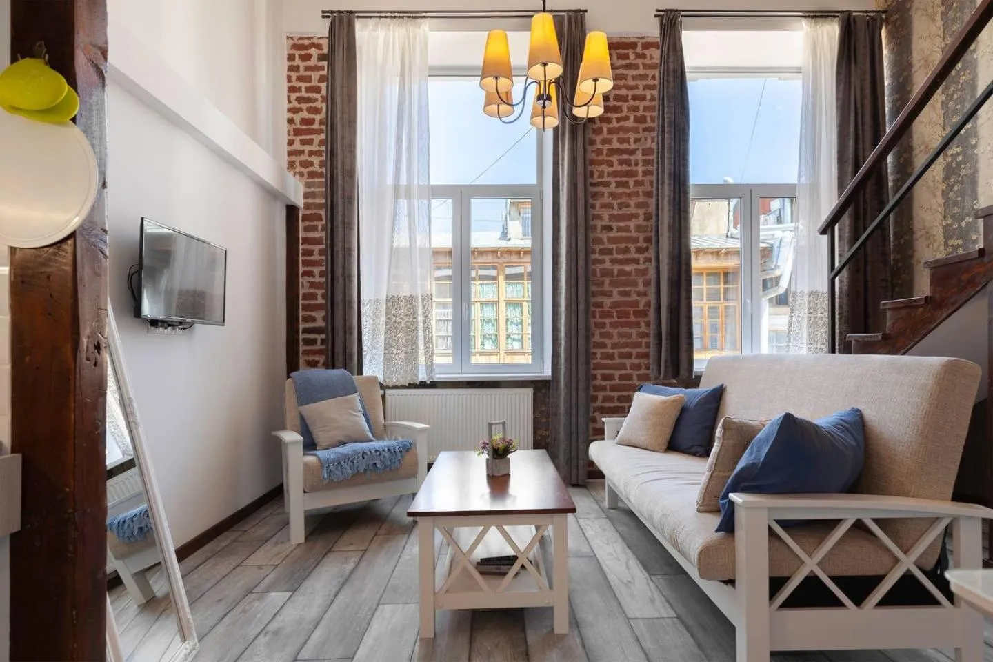 Living room in Cozy Studios on Freedom Square