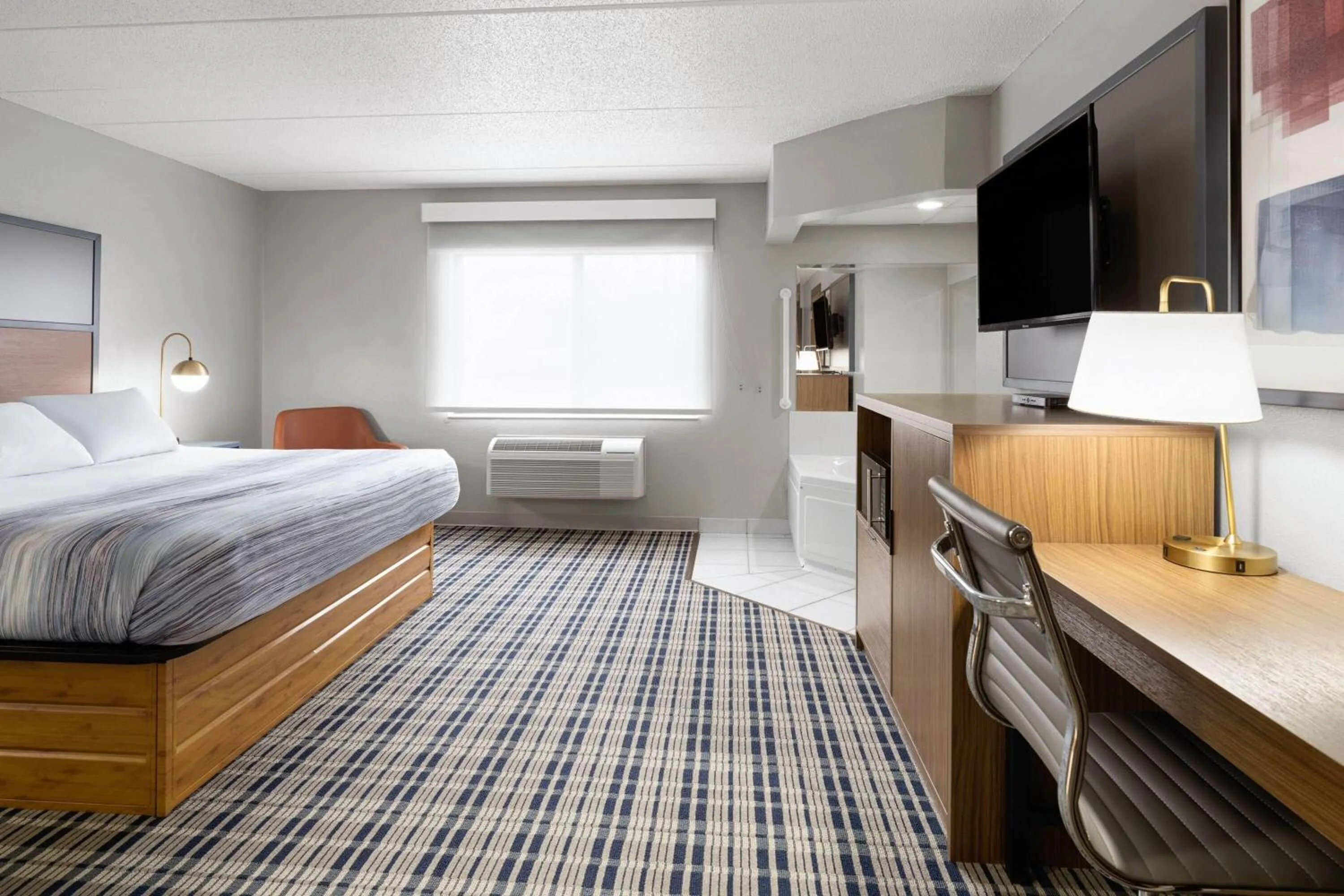 Photo of the whole room, Bed in AmericInn by Wyndham Muscatine