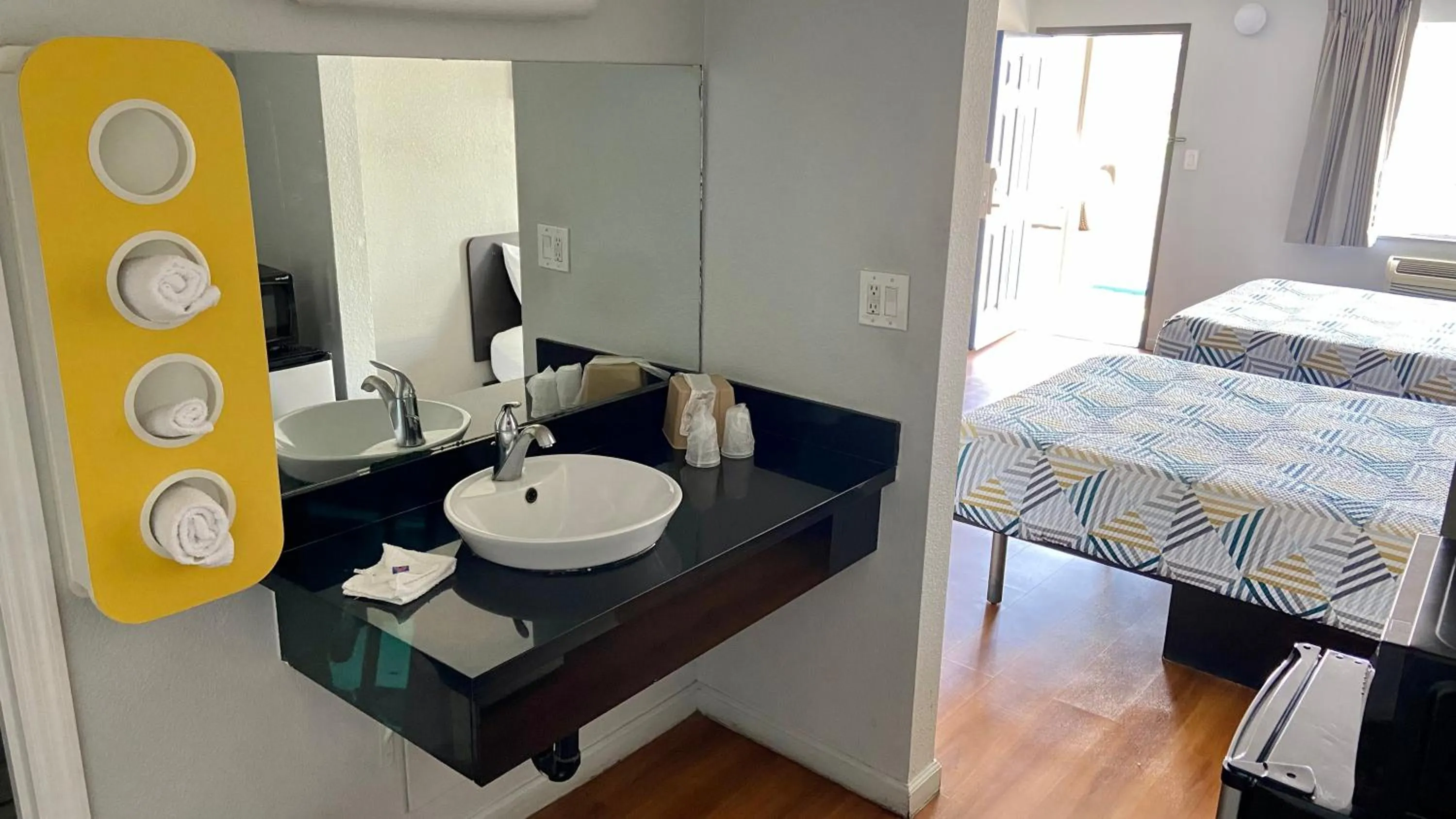 Bathroom, Bed in Motel 6-Delano, CA