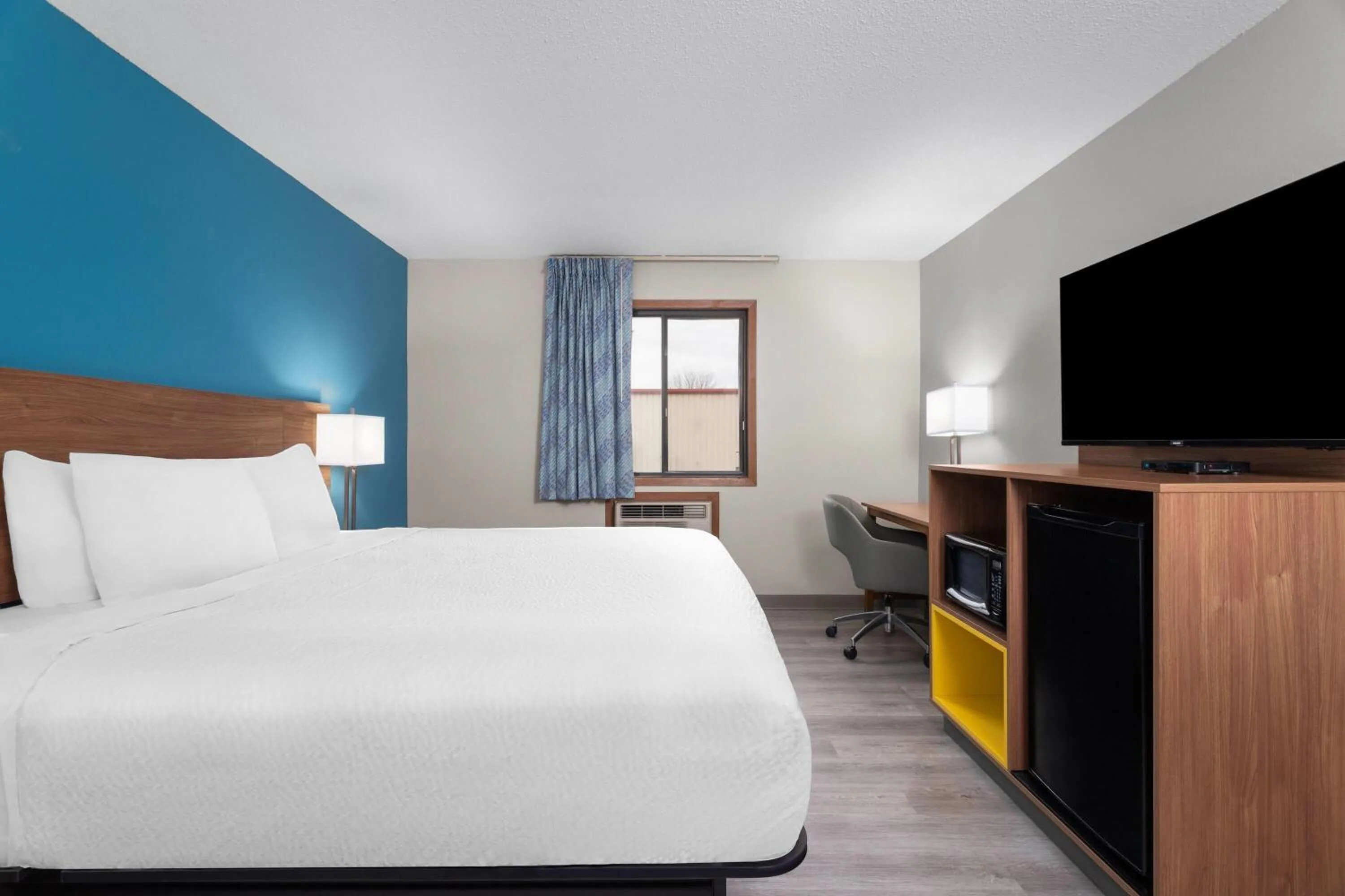 Photo of the whole room, Bed in Days Inn by Wyndham Austin