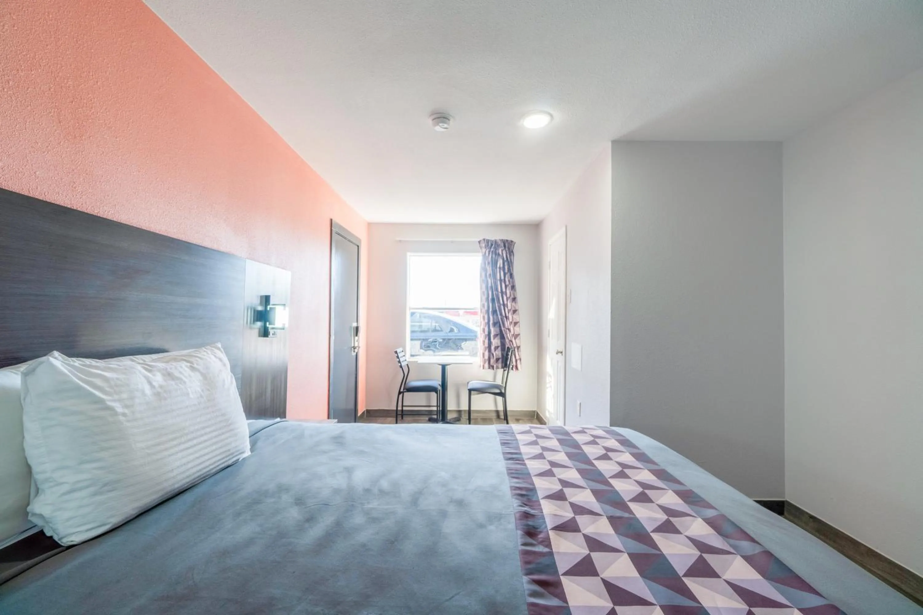 Bedroom in Royal Inn