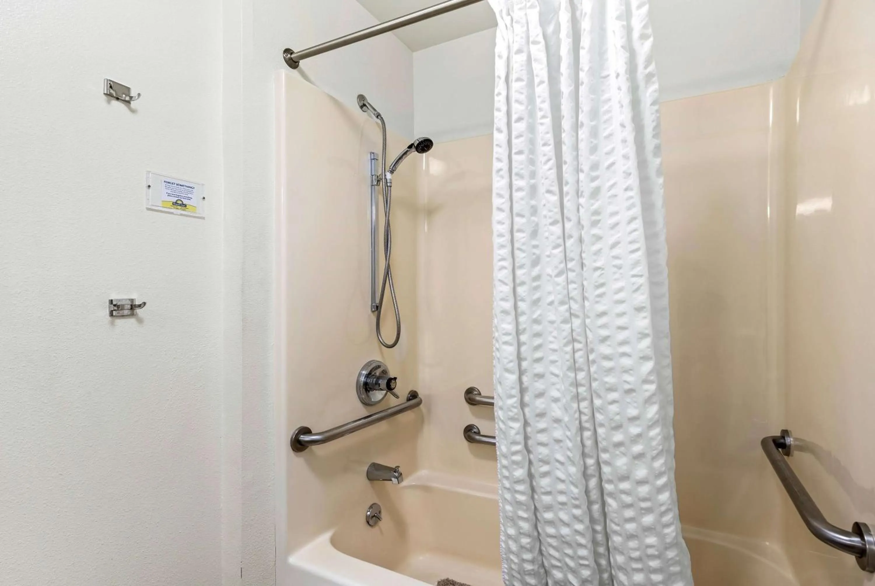 Bathroom in Days Inn by Wyndham Great Falls