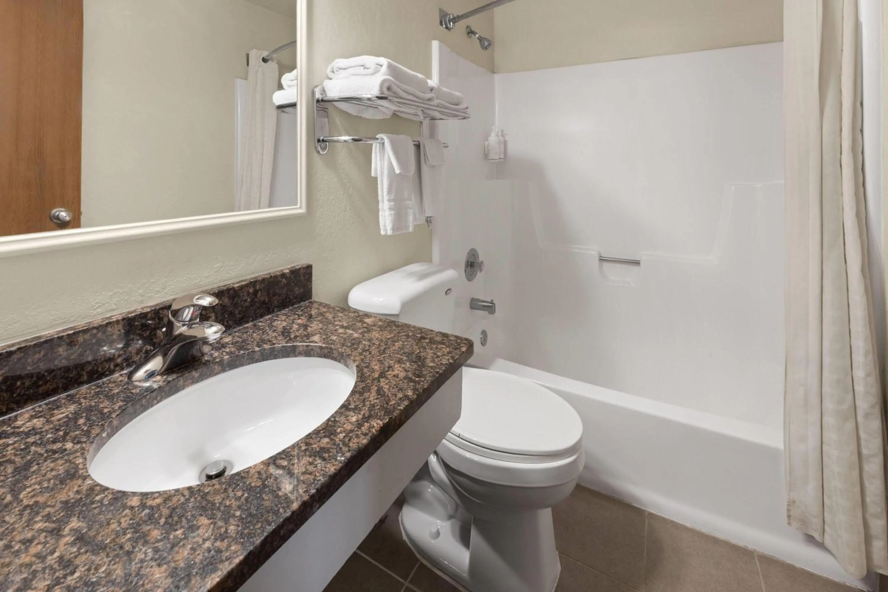 Bathroom in Super 8 by Wyndham Winona MN