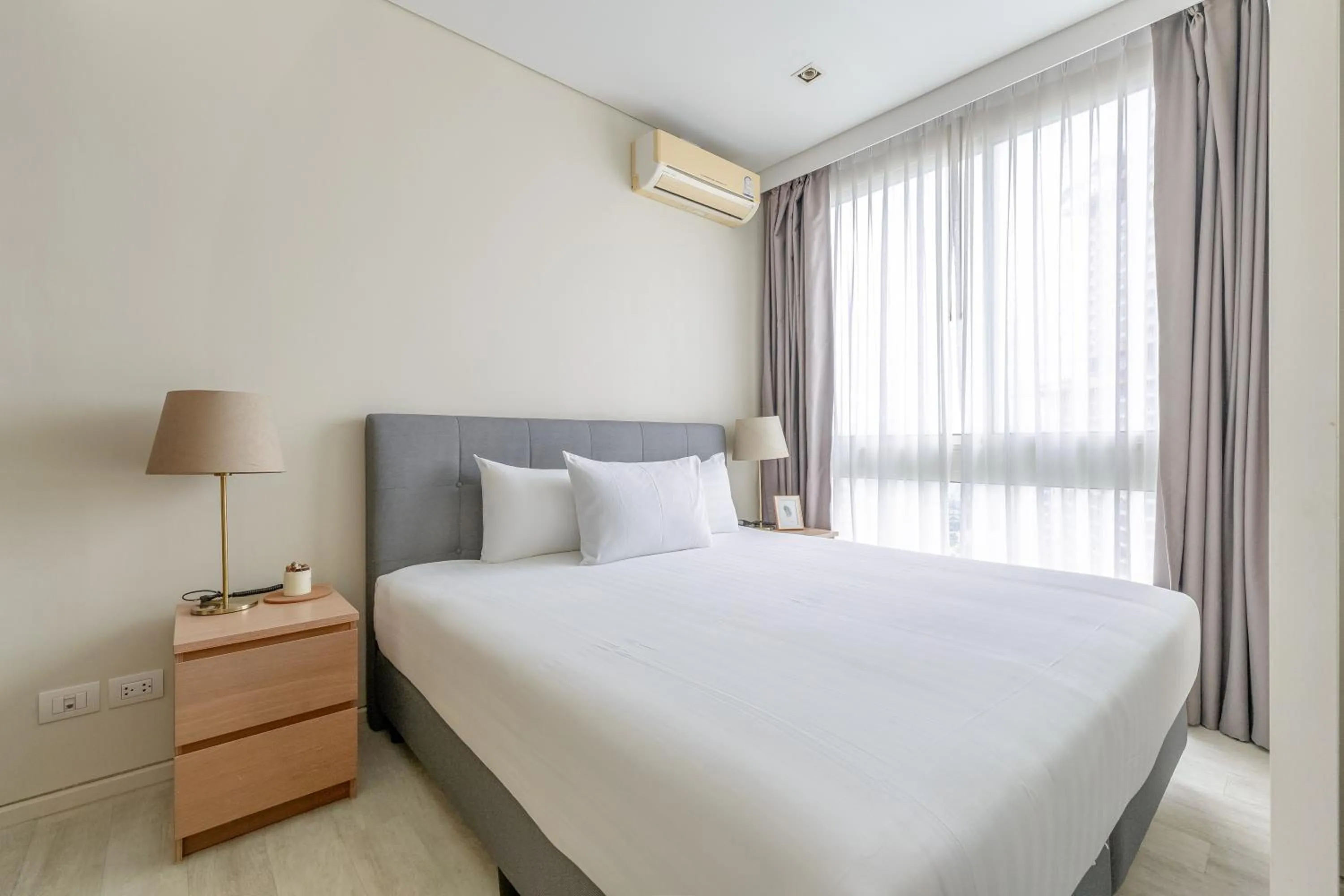 Bed in Pattaya Holiday at Veranda Residence Pattaya