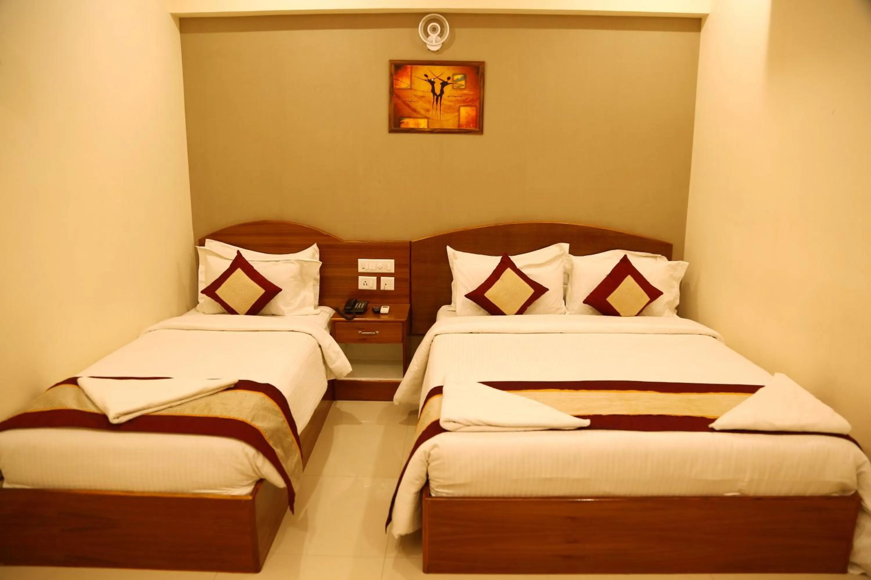 Bed in Nitheesh Residency