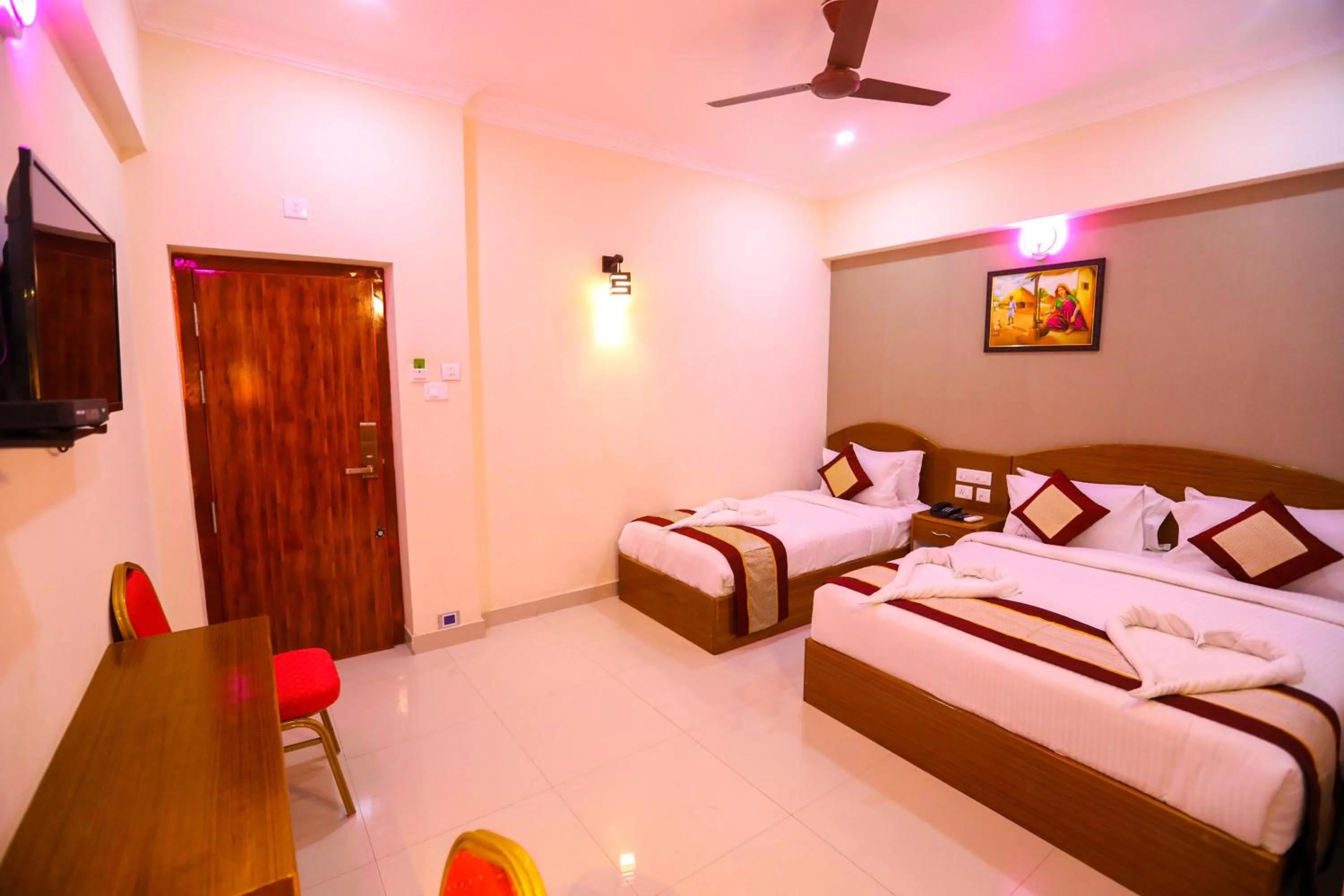 Photo of the whole room, Bed in Nitheesh Residency