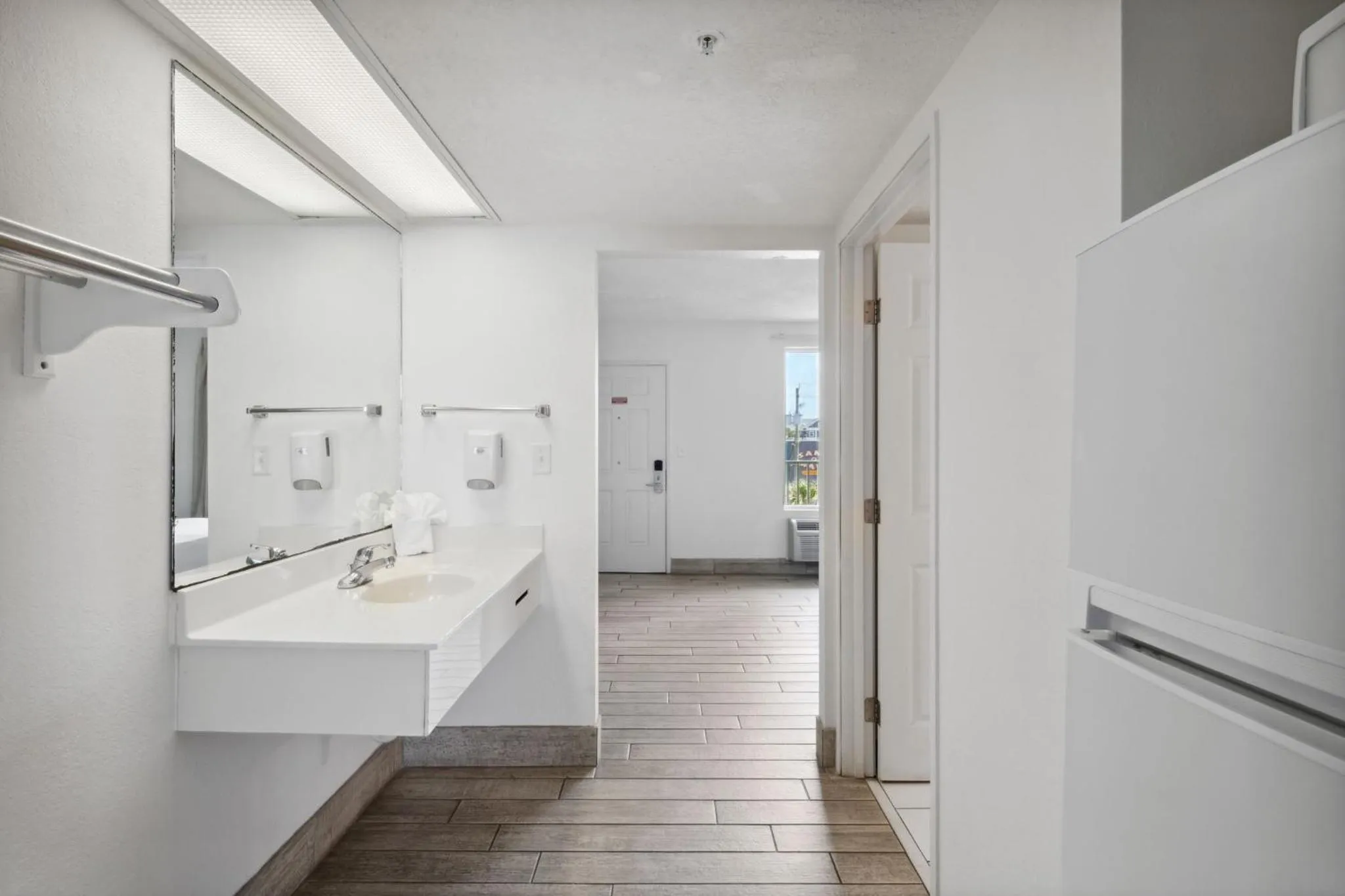 Bathroom in Holiday Terrace Beachfront Hotel, a By The Sea Resort