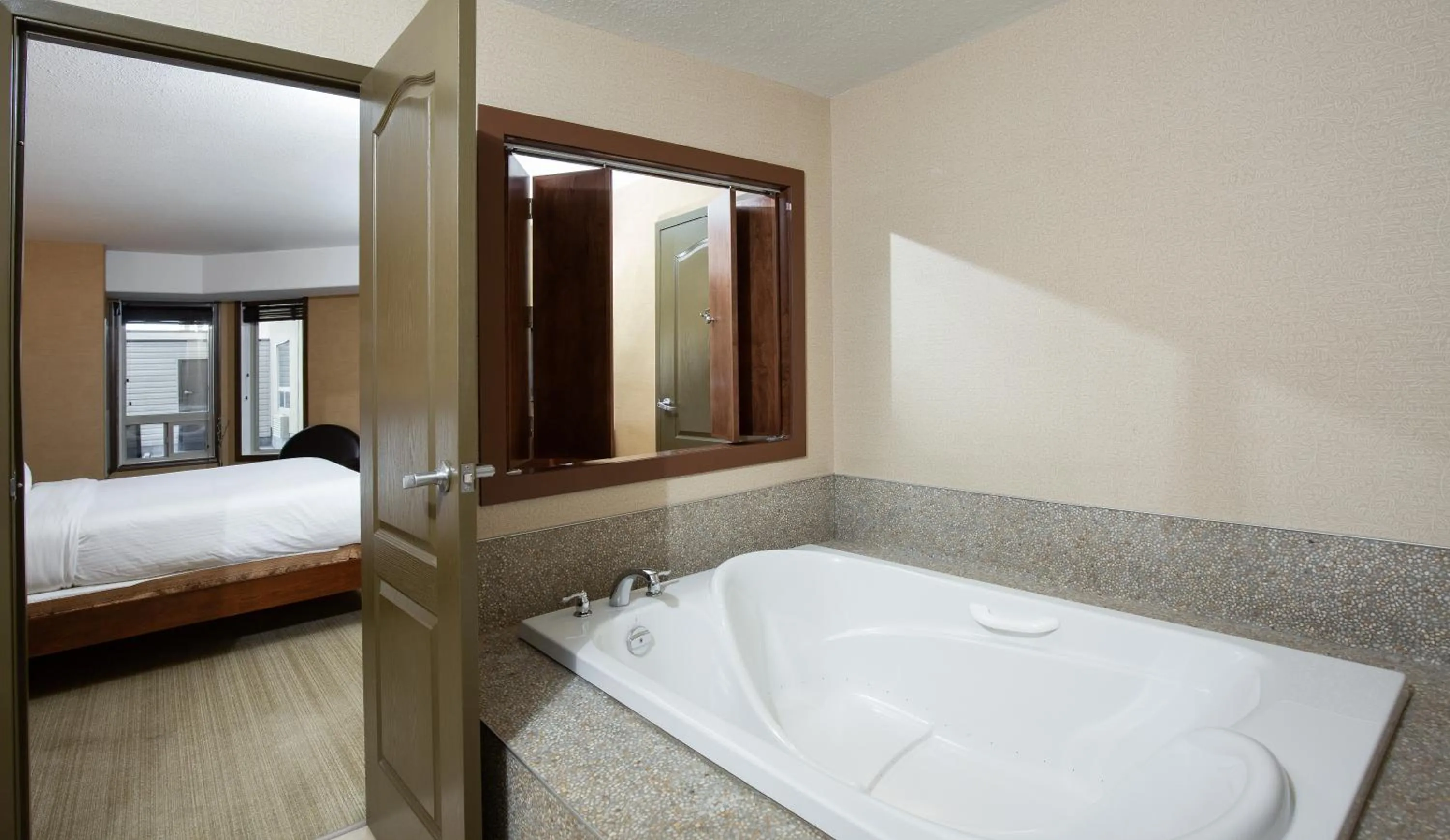 Bathroom, Bed in Pomeroy Hotel Fort St. John