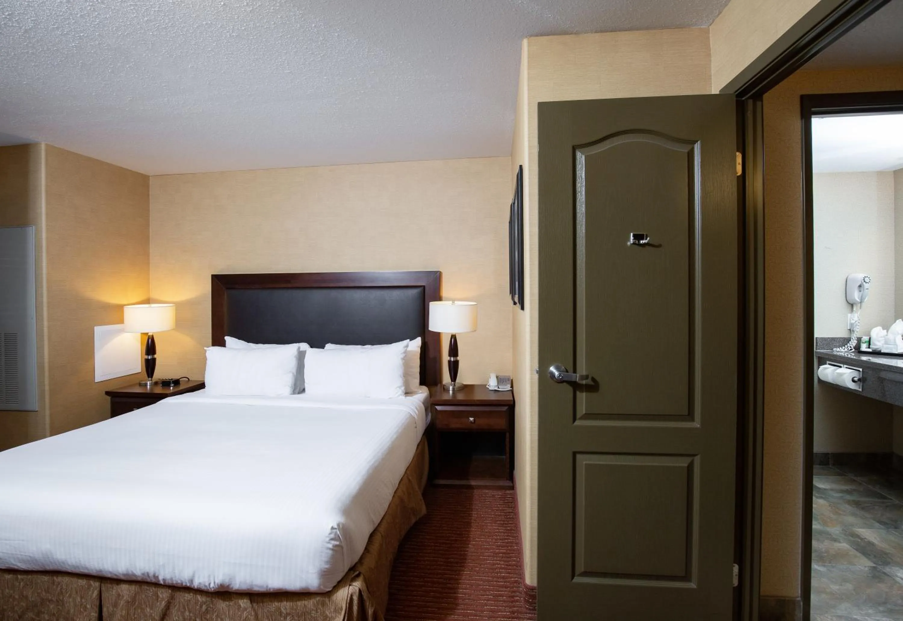 Bed in Pomeroy Hotel Fort St. John