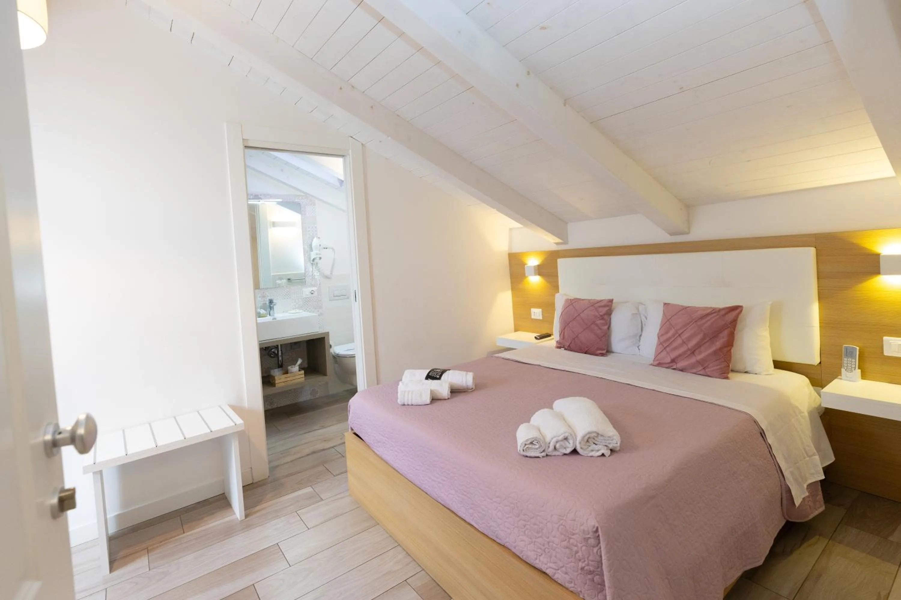 Bed in B&B Island Tropea -Sea View Rooms & Suites-