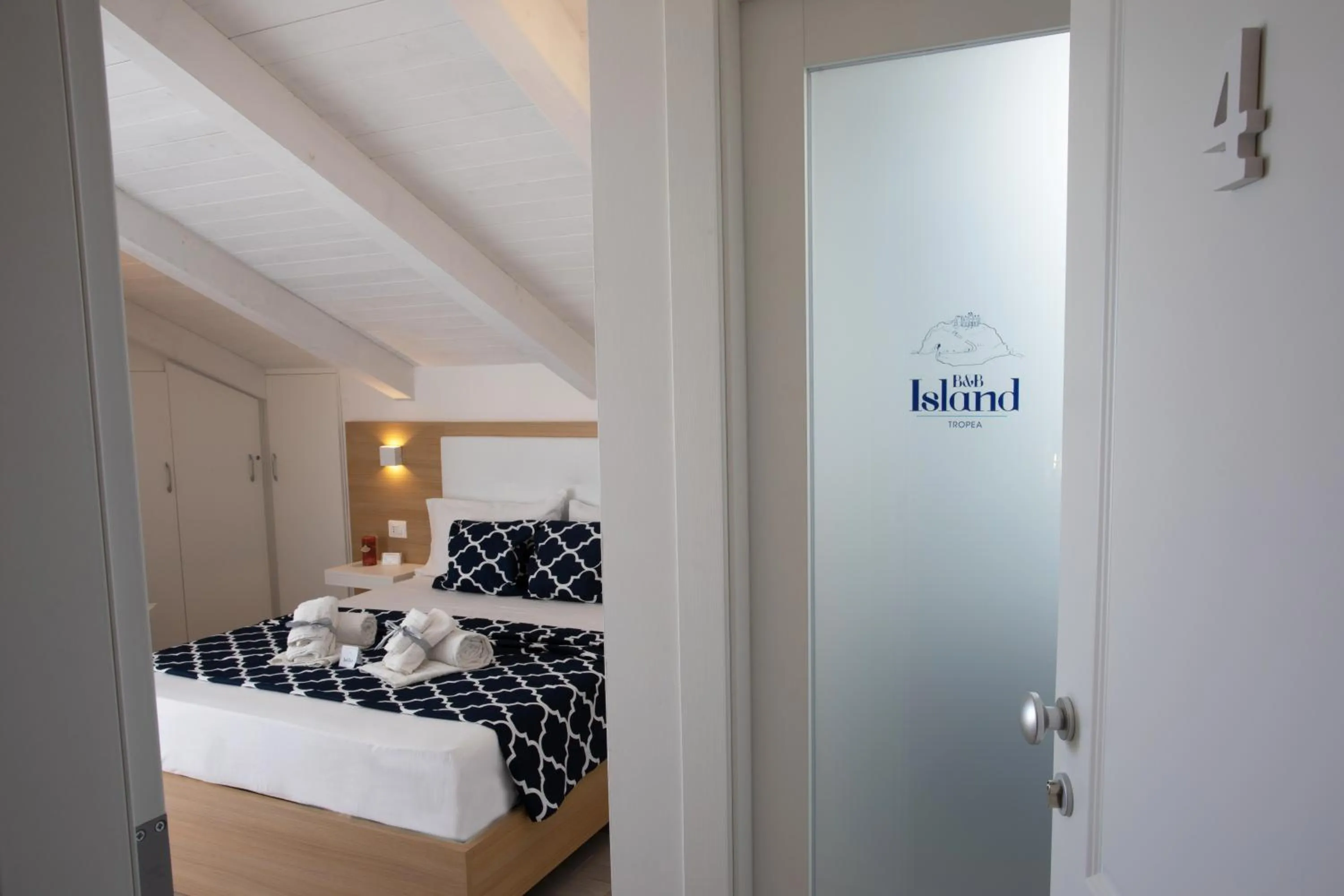 Bed in B&B Island Tropea -Sea View Rooms & Suites-