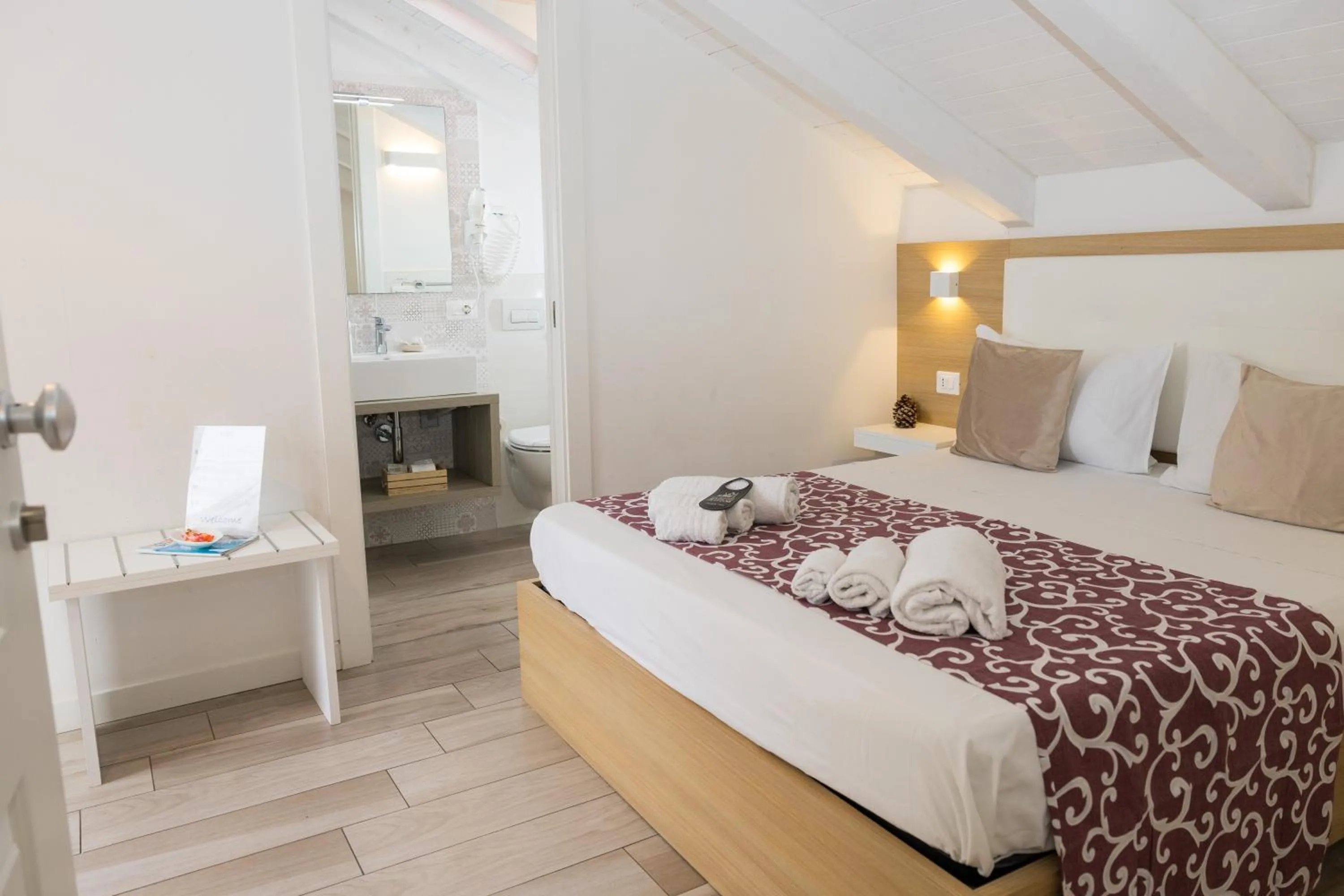 Bed in B&B Island Tropea -Sea View Rooms & Suites-