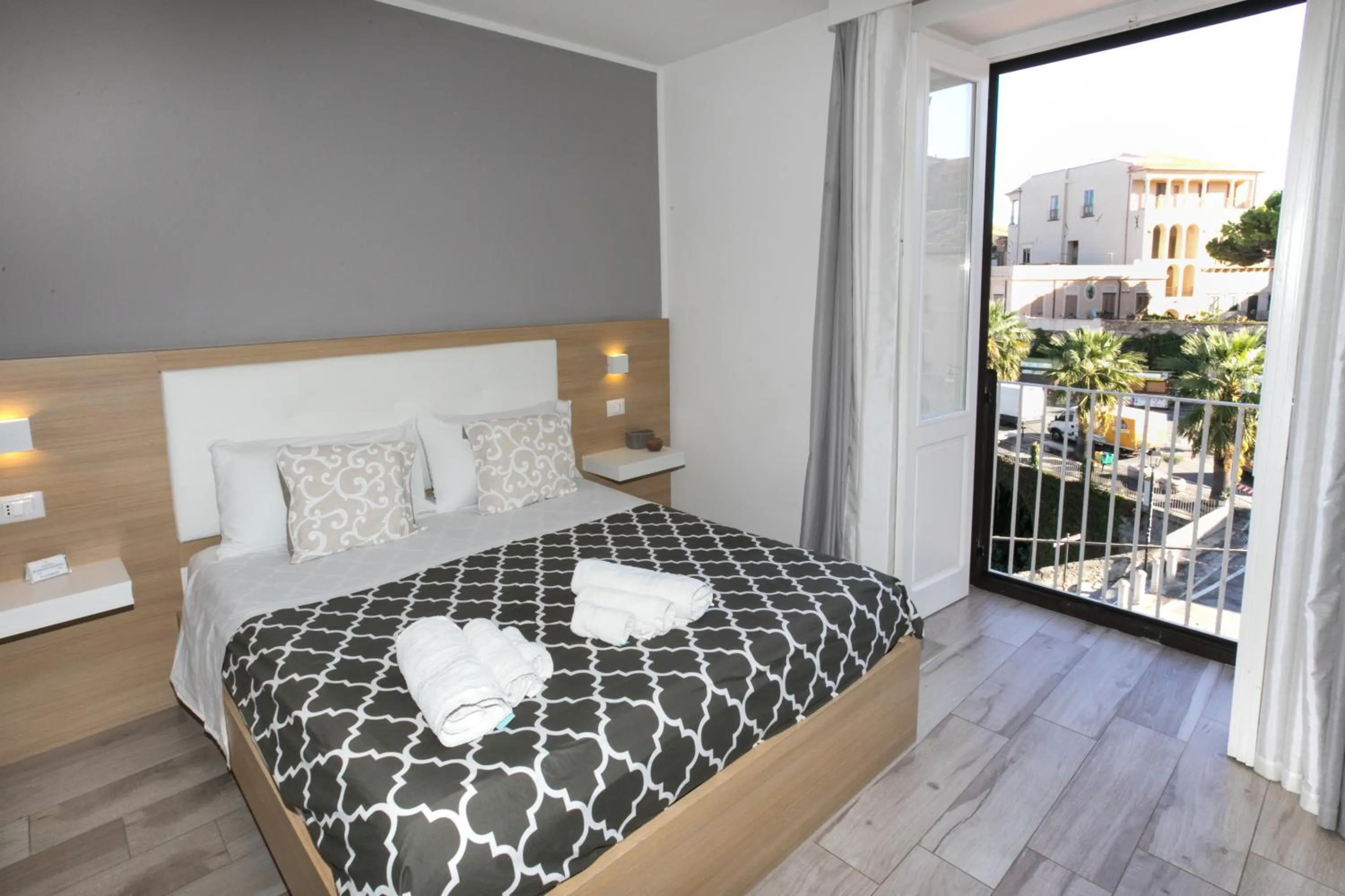 Bed in B&B Island Tropea -Sea View Rooms & Suites-