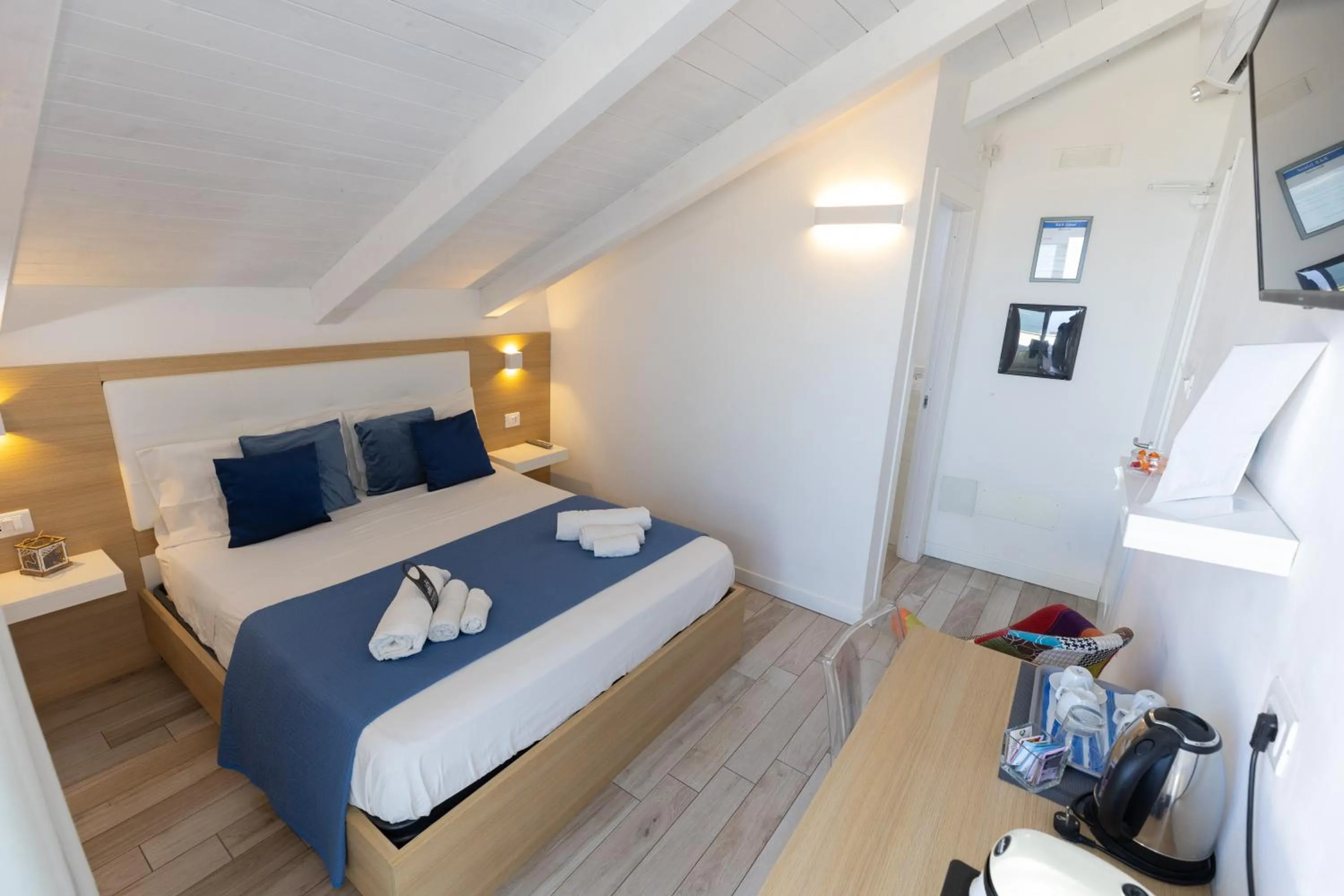 Bed in B&B Island Tropea -Sea View Rooms & Suites-