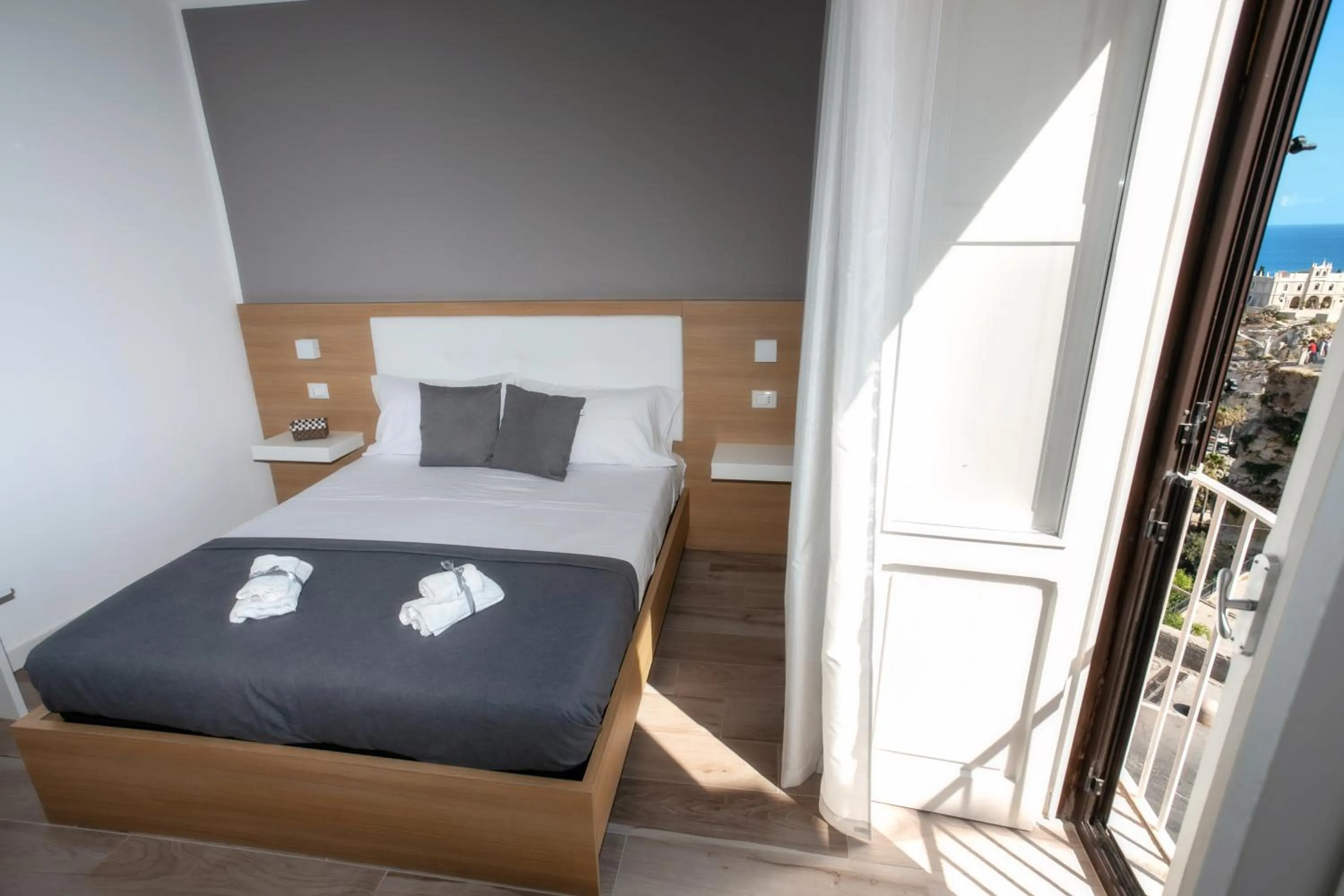 Bed in B&B Island Tropea -Sea View Rooms & Suites-