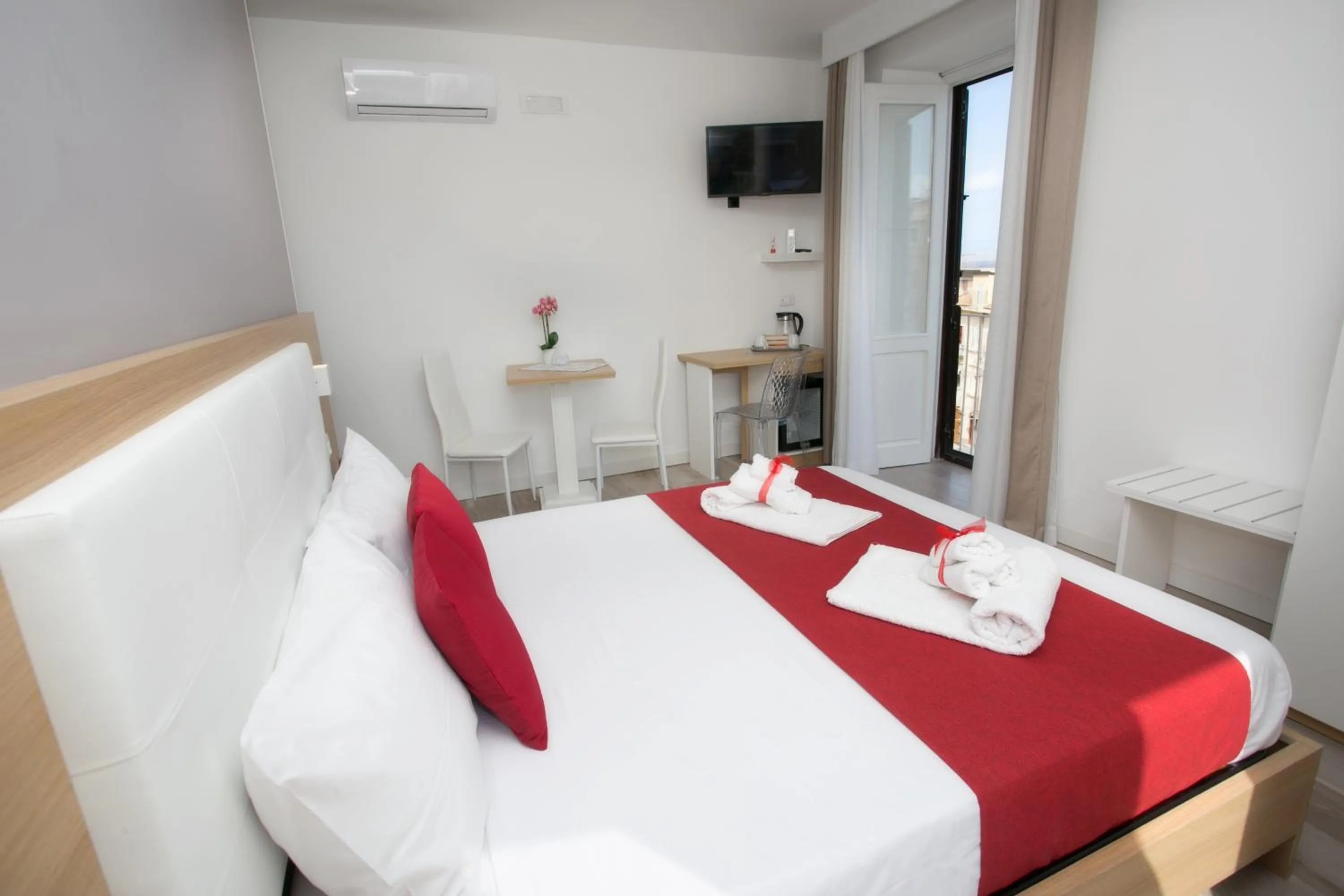 Bed in B&B Island Tropea -Sea View Rooms & Suites-
