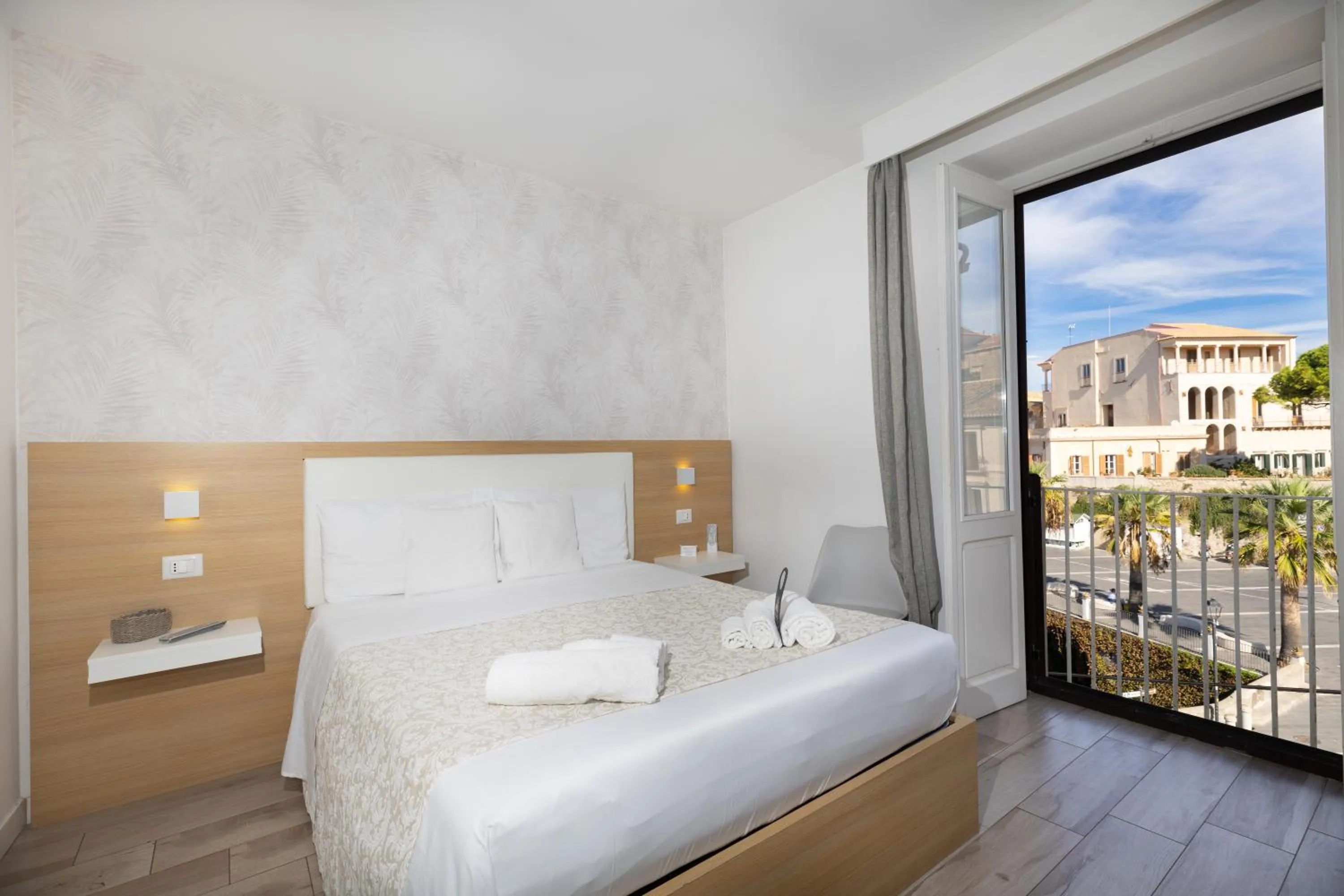 Bed in B&B Island Tropea -Sea View Rooms & Suites-