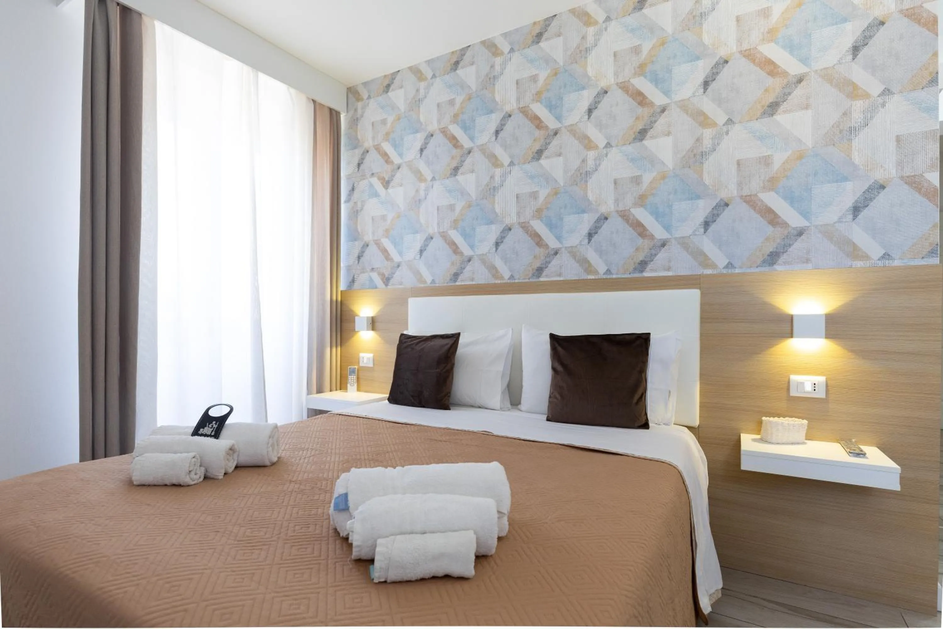 Bed in B&B Island Tropea -Sea View Rooms & Suites-