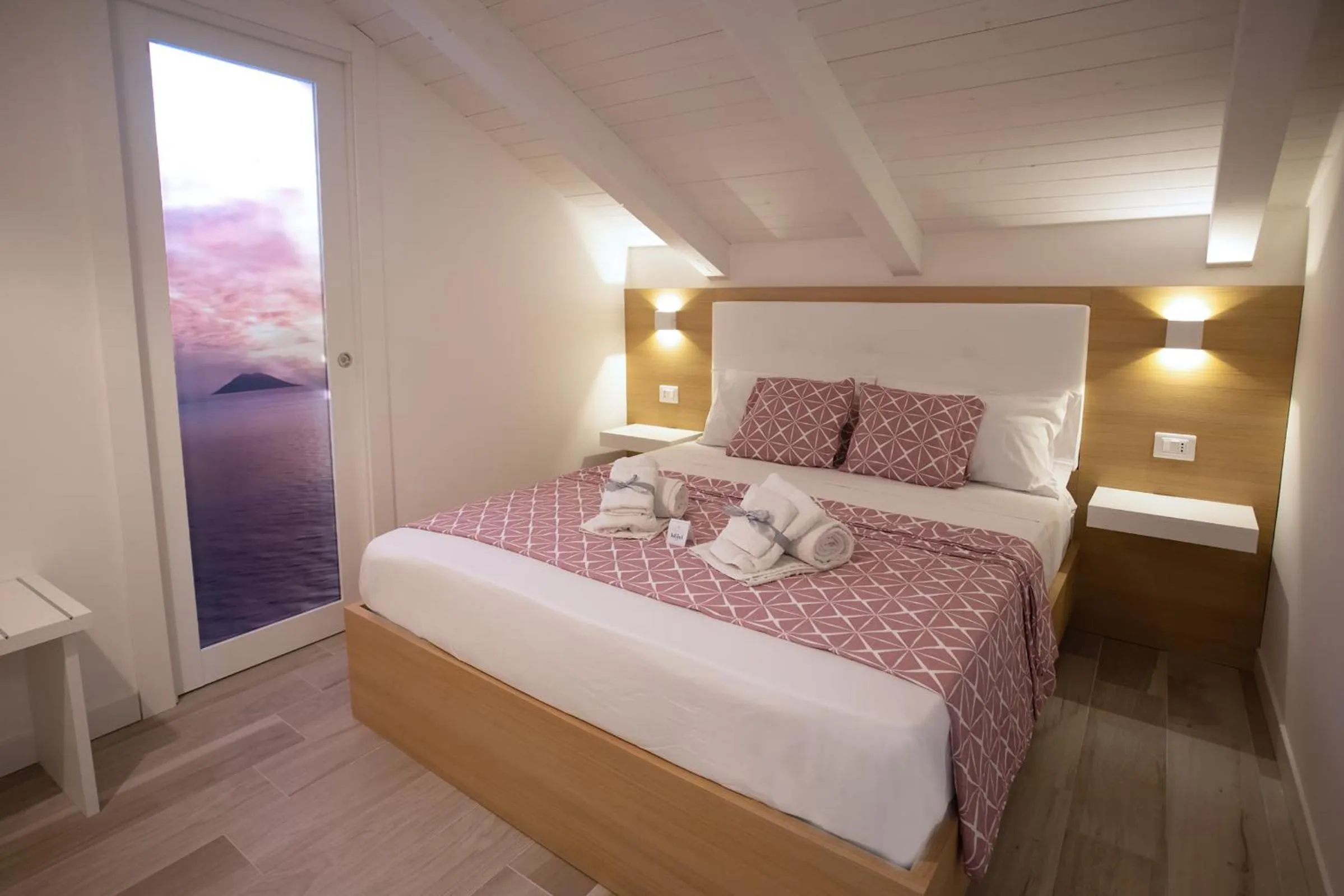 Bed in B&B Island Tropea -Sea View Rooms & Suites-