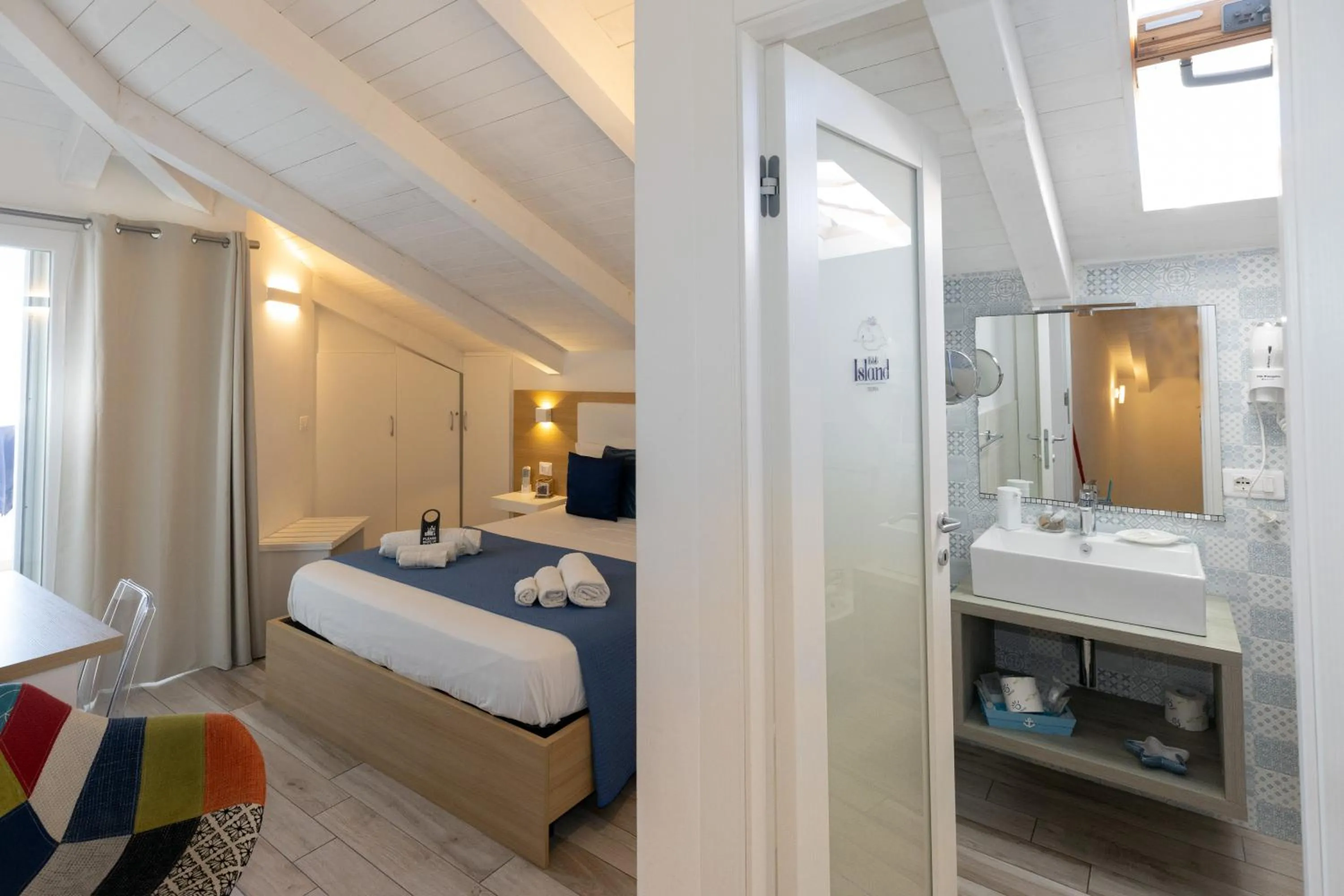 Bed in B&B Island Tropea -Sea View Rooms & Suites-