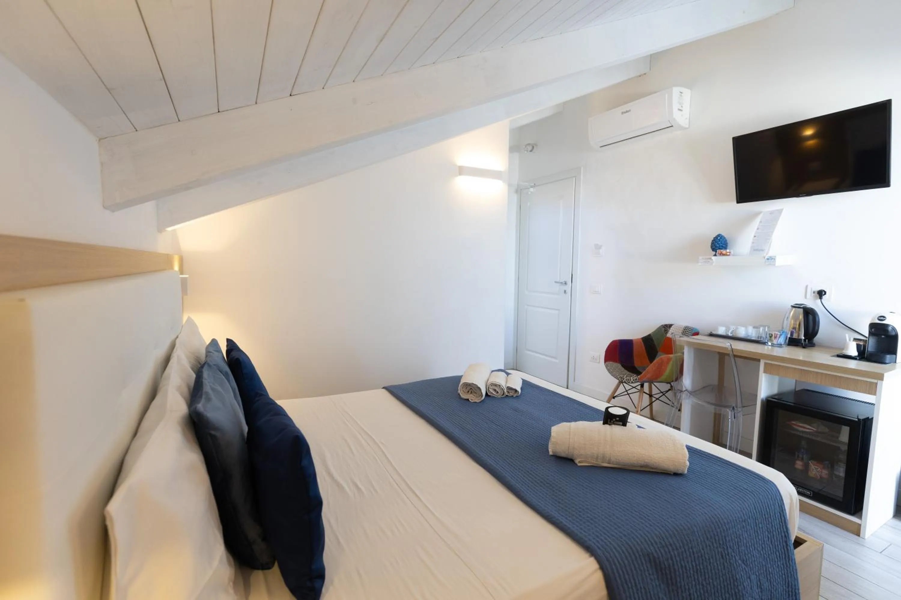 Bed in B&B Island Tropea -Sea View Rooms & Suites-