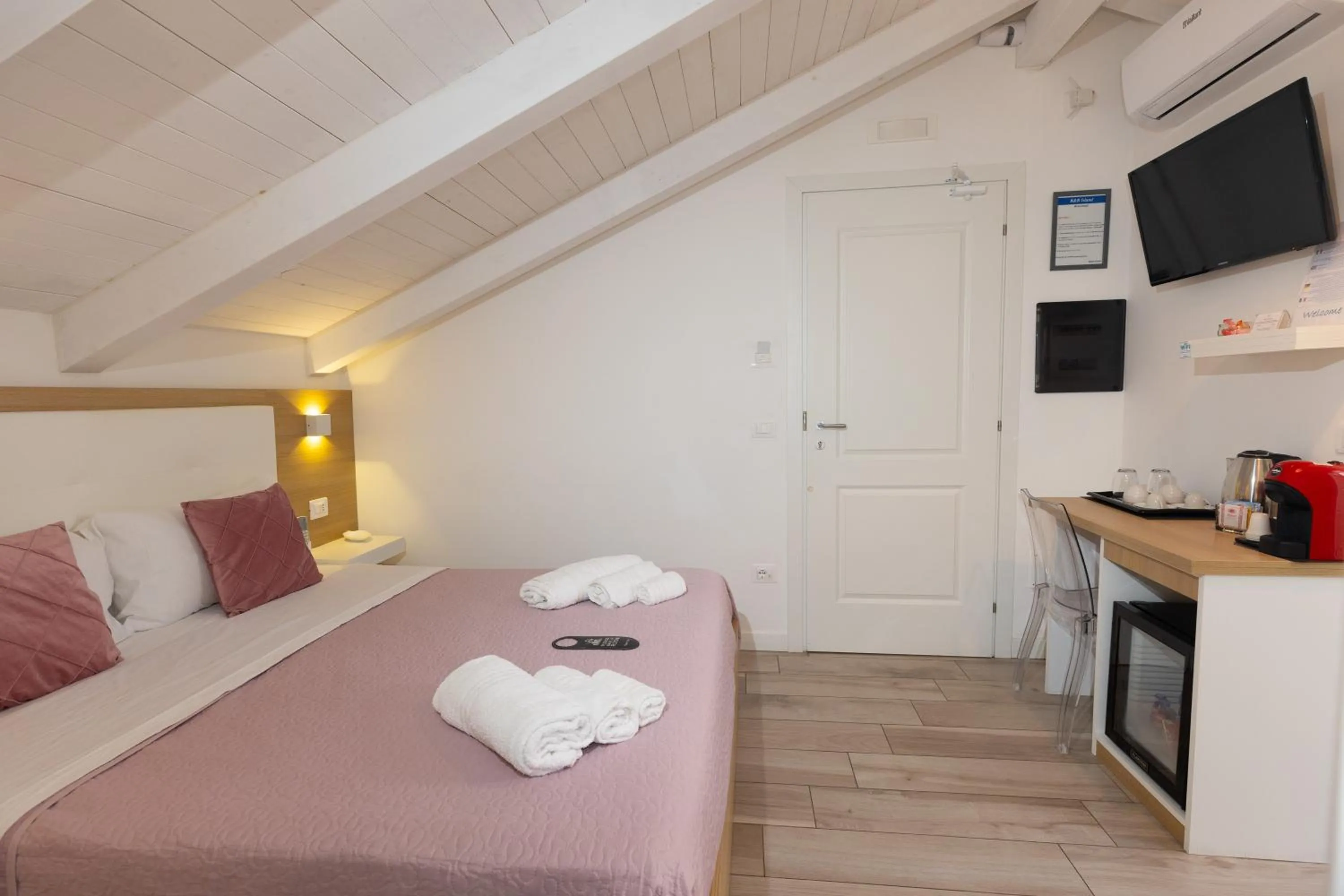 Bed in B&B Island Tropea -Sea View Rooms & Suites-