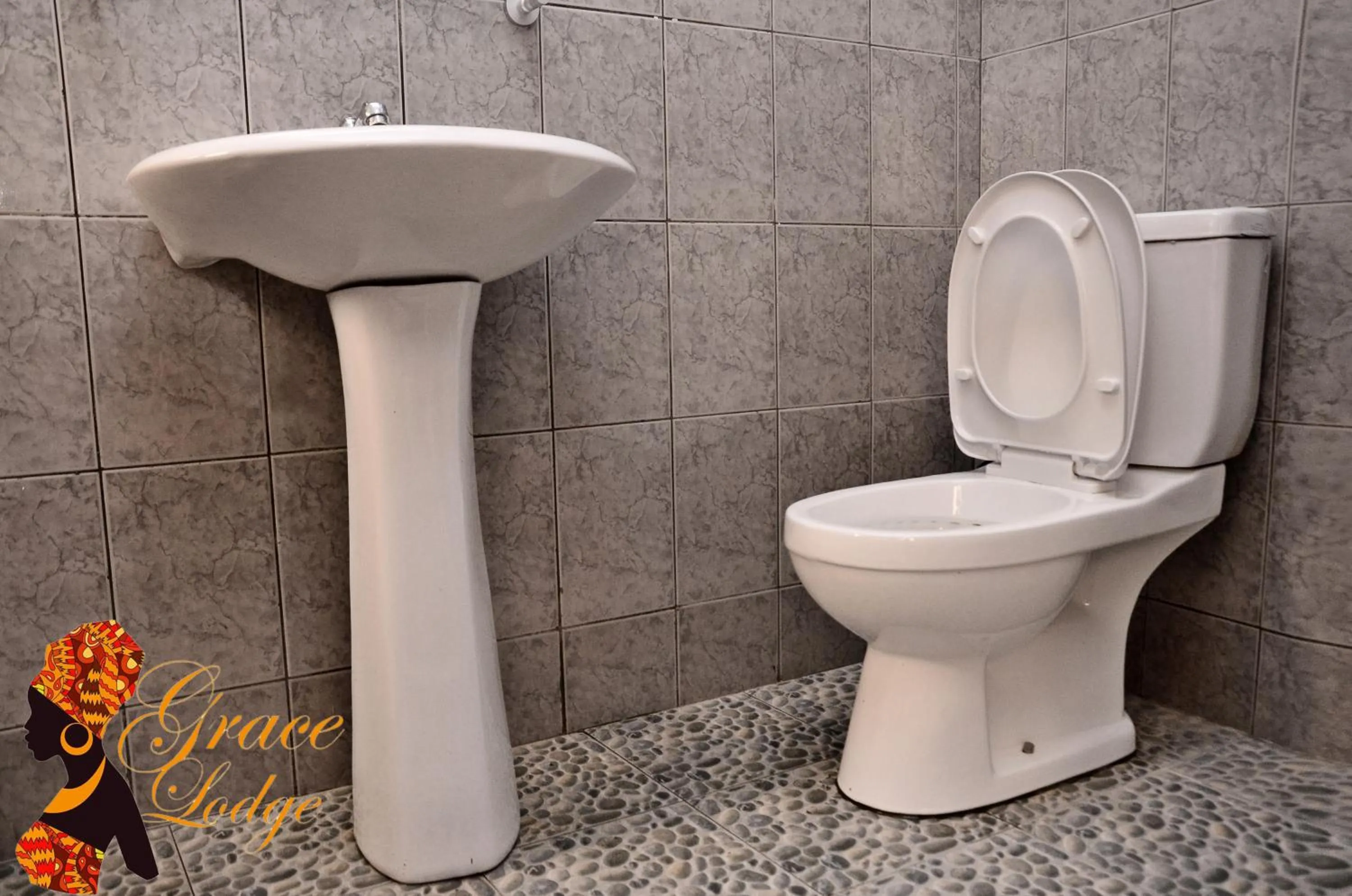 Toilet in GRACE LODGE