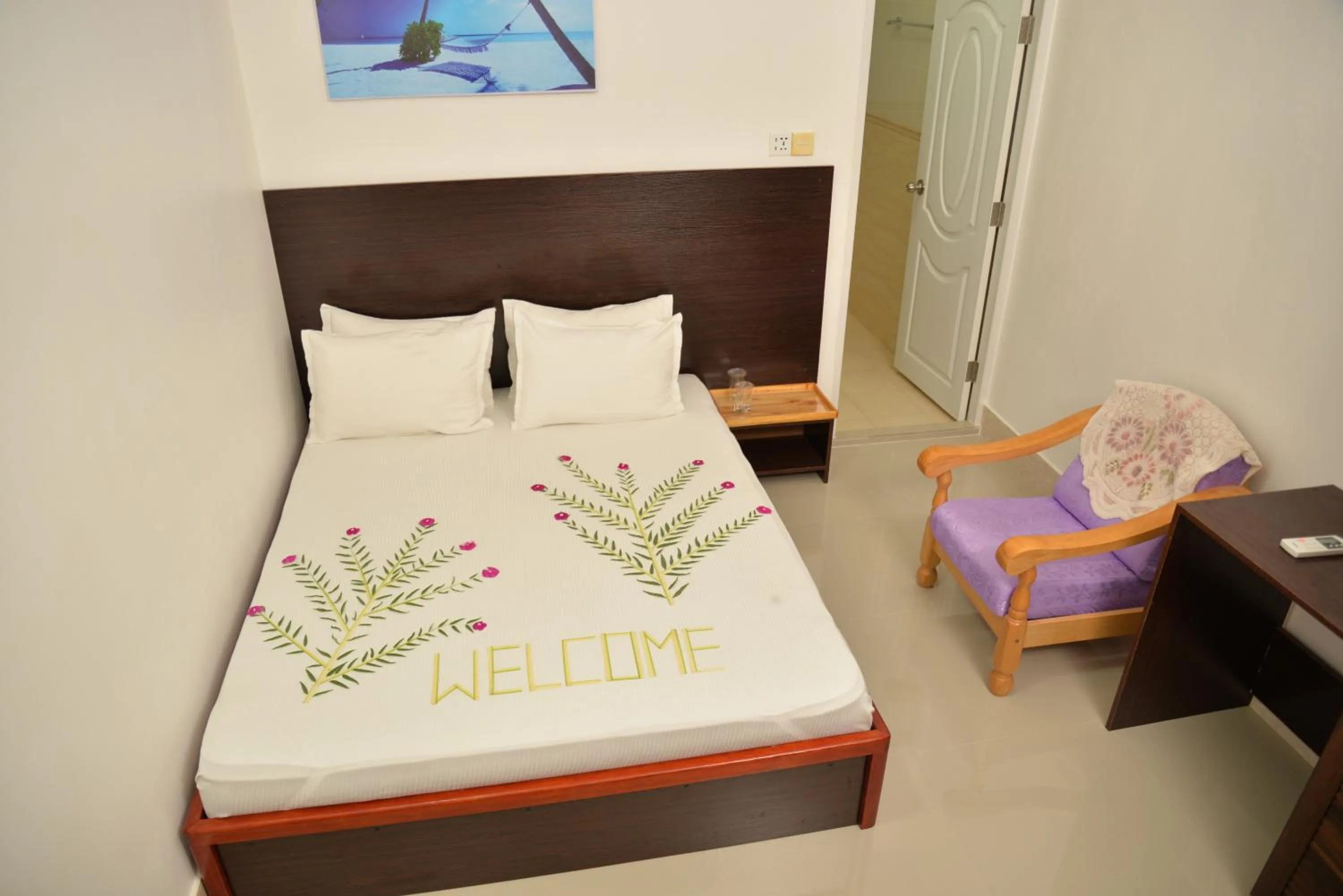 Toilet, Bed in Moodhumaa Inn