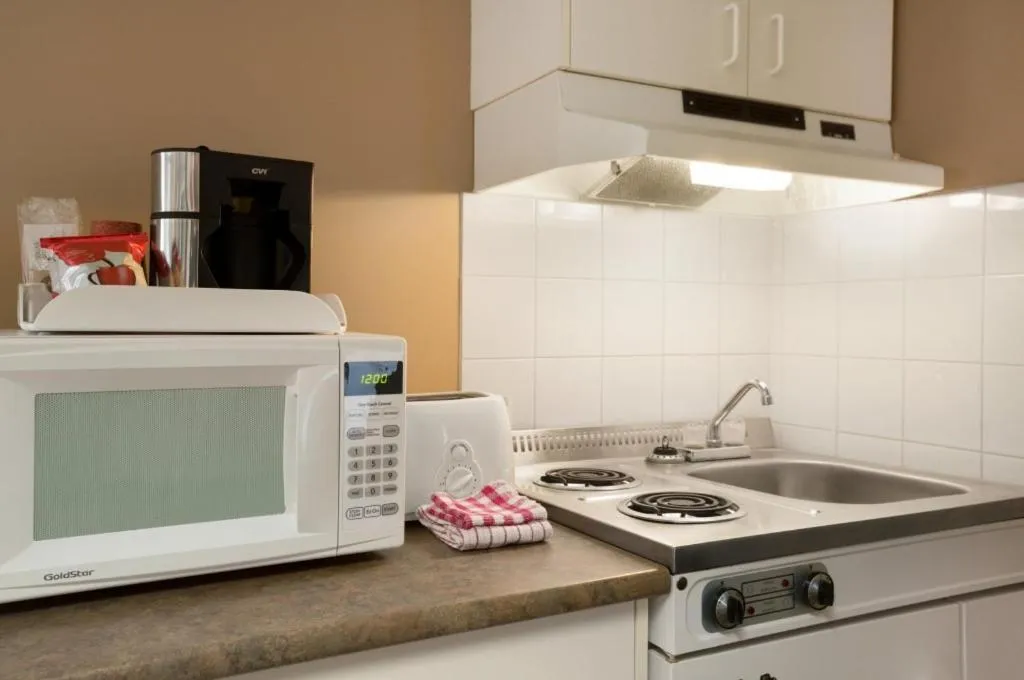 Kitchen or kitchenette in Central Suite Hotel