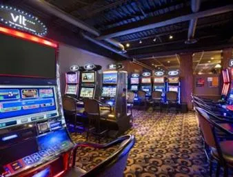 Communal lounge/ TV room in Central Suite Hotel