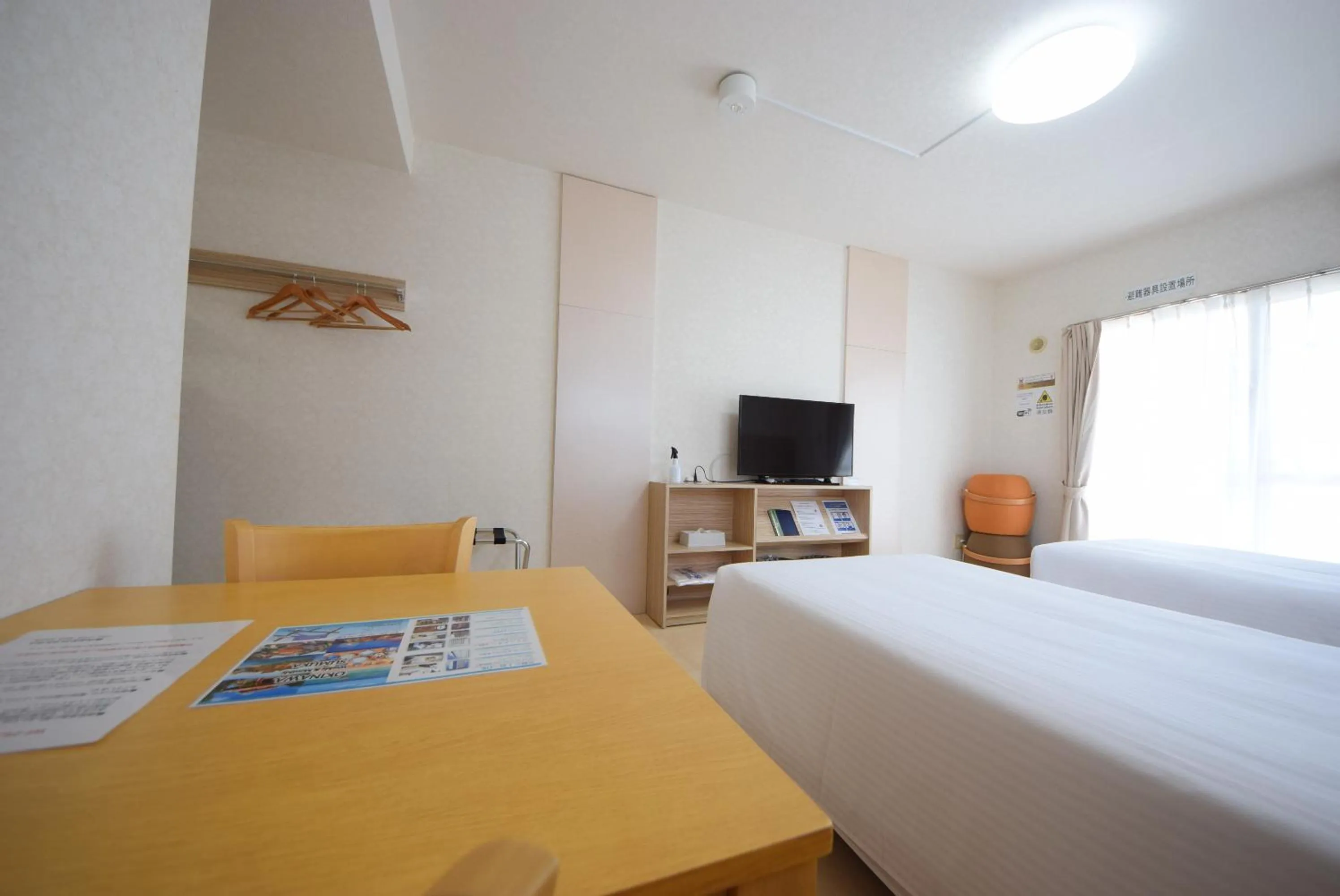 Photo of the whole room, TV/Entertainment Center in STAY IN SUMUKA Kokusai Street